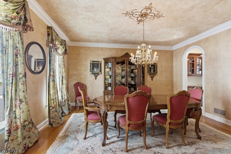 4 Deer Trail Road Saddle River, NJ 07458 - Photo 6 of 37 a view of a dining room with furniture and chandelier