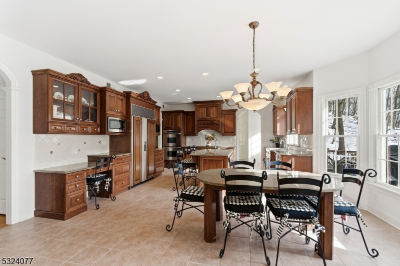 4 Deer Trail Road Saddle River, NJ 07458 - Photo 10 of 37 a view of a dining room with furniture window and wooden floor