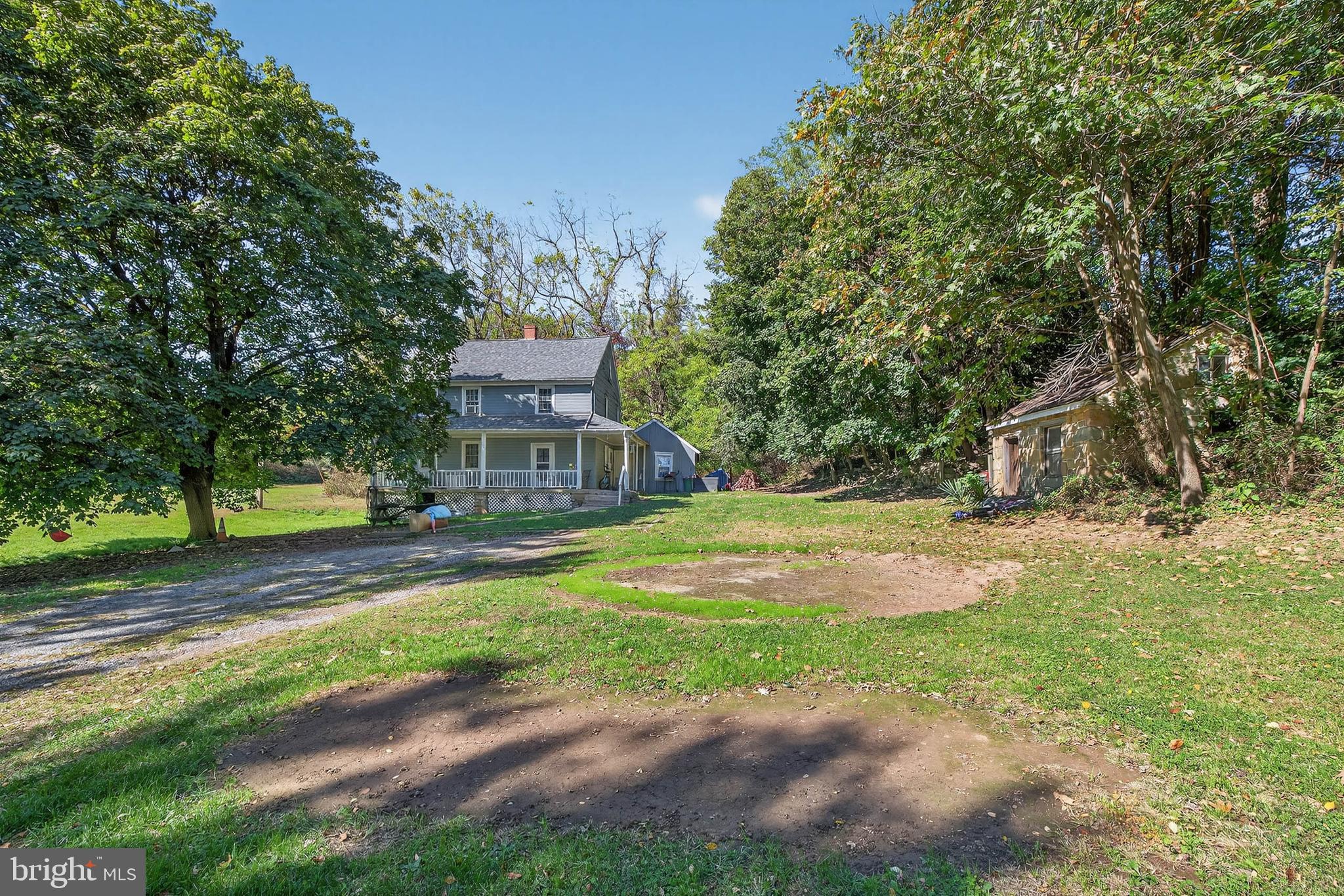 395 Prospect Road Elizabethtown, PA 17022 - Photo 8 of 26 a front view of a house with yard and green space