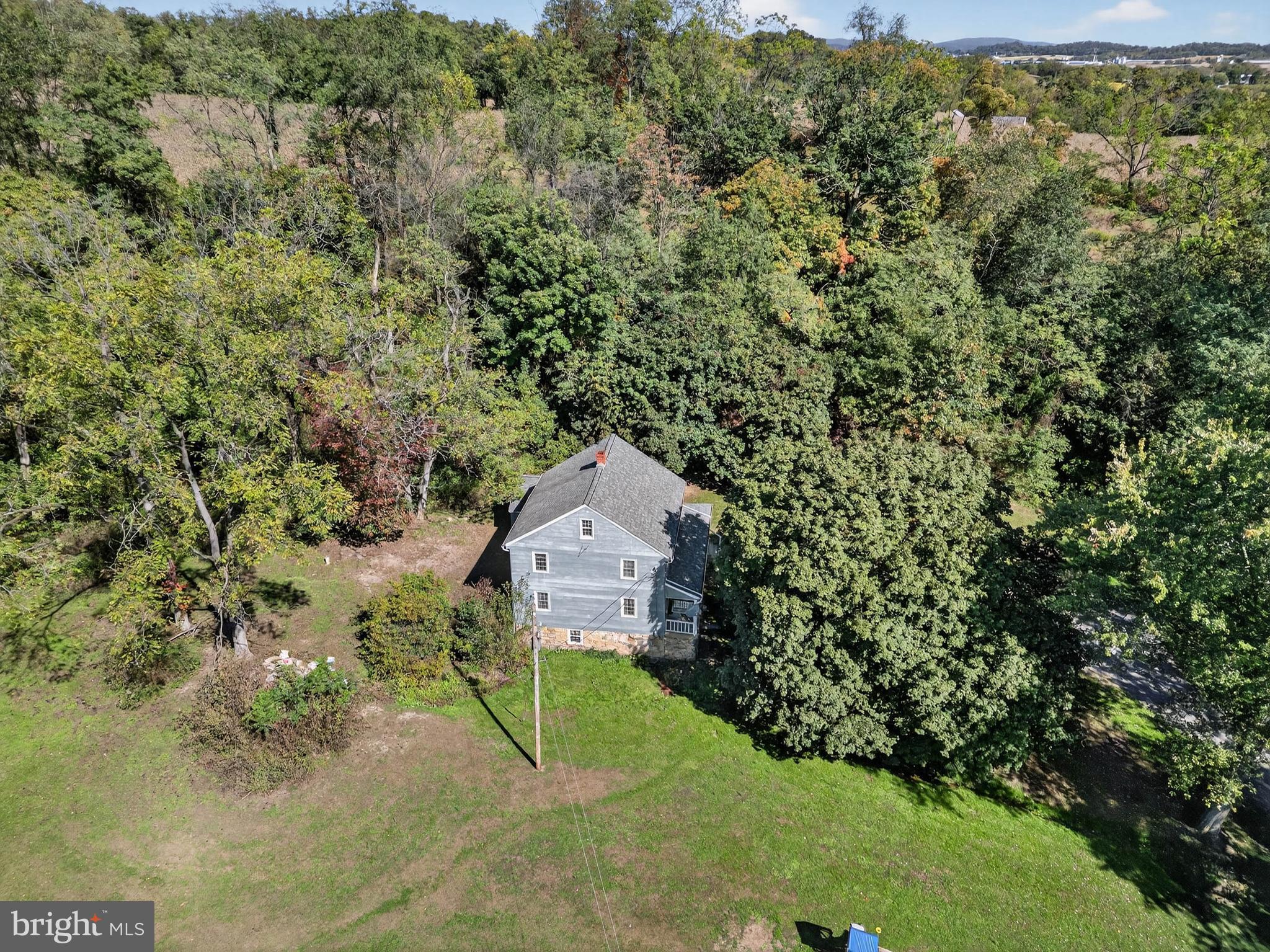 395 Prospect Road Elizabethtown, PA 17022 - Photo 9 of 26 a aerial view of a house with a yard and large tree