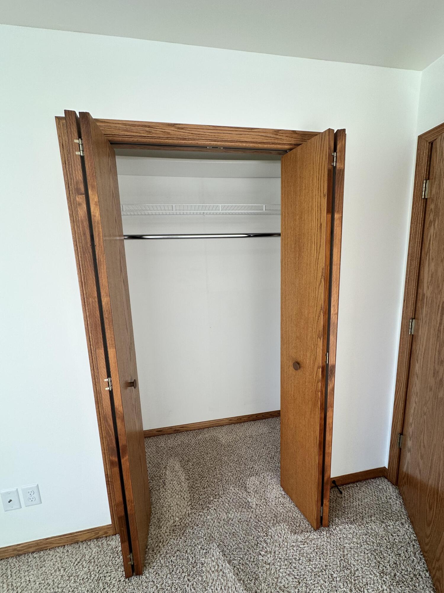 1133 Ellys Way Slinger, WI 53086 - Photo 18 of 35 Robert McCaigue - 1135 - BR 2 Closet