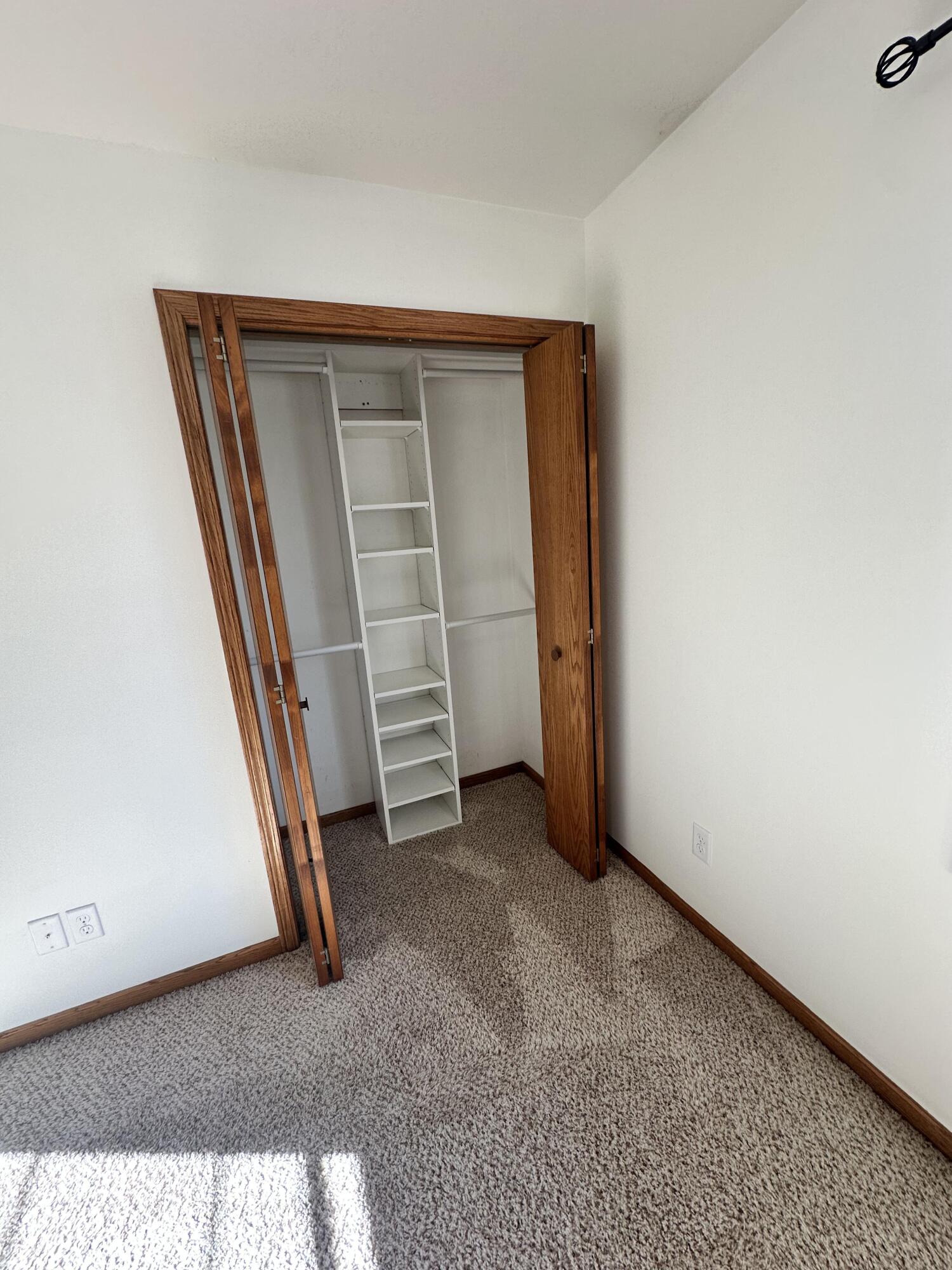 1133 Ellys Way Slinger, WI 53086 - Photo 20 of 35 Robert McCaigue - 1135 - BR 3 Closet