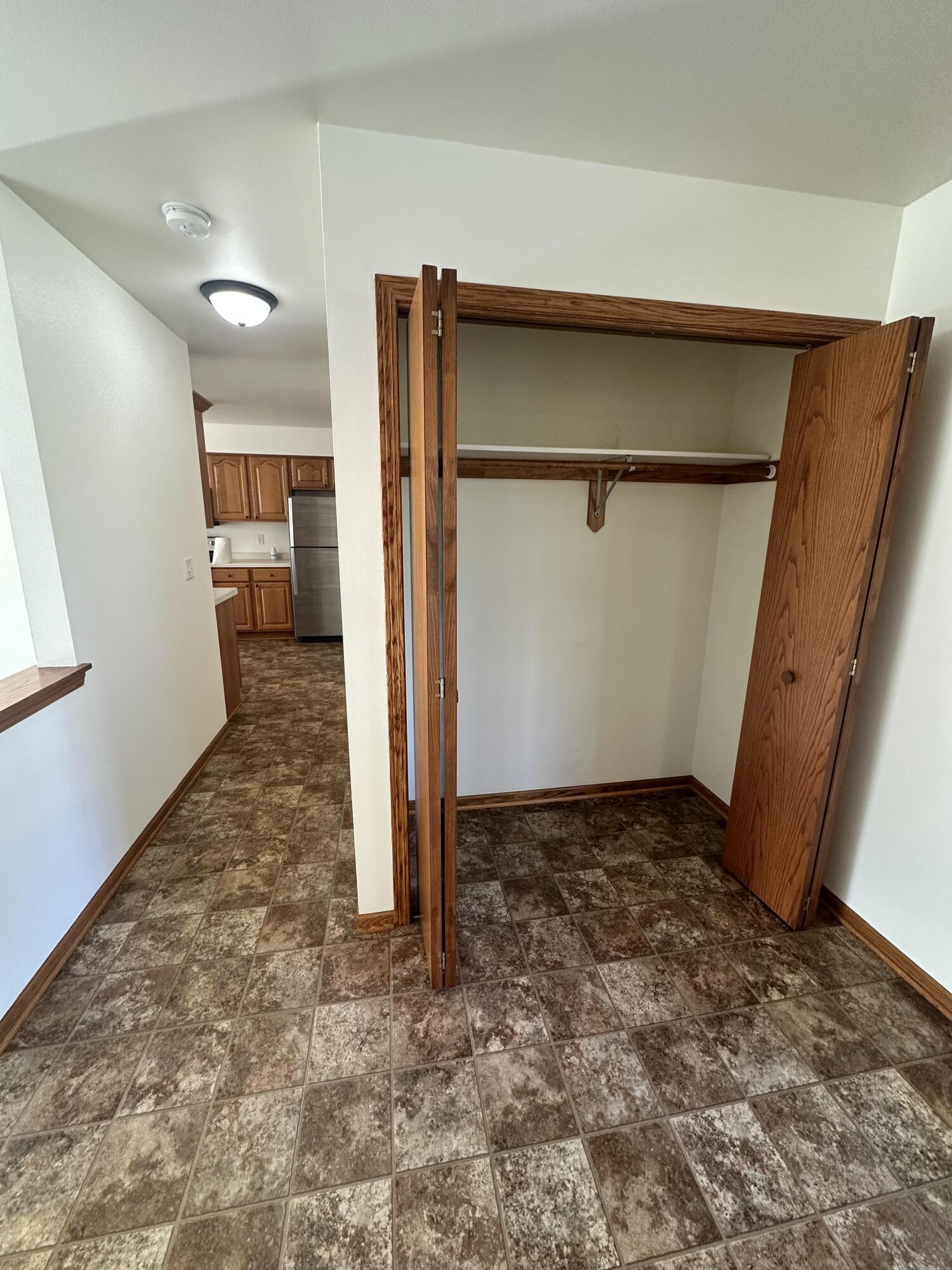 1133 Ellys Way Slinger, WI 53086 - Photo 22 of 35 Robert McCaigue - 1135 - Coat Closet