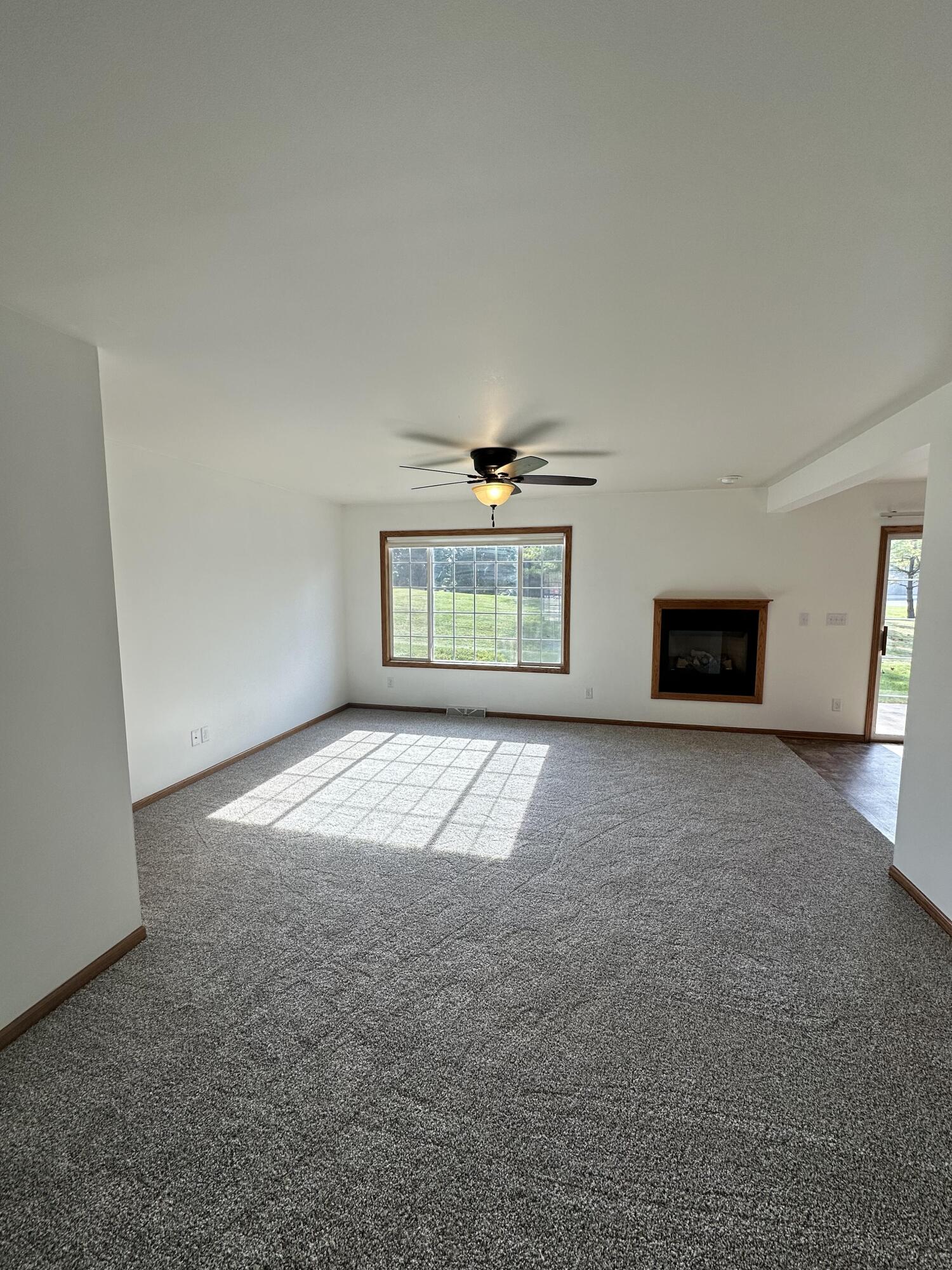 1133 Ellys Way Slinger, WI 53086 - Photo 29 of 35 Robert McCaigue - 1135 - Living Room 2