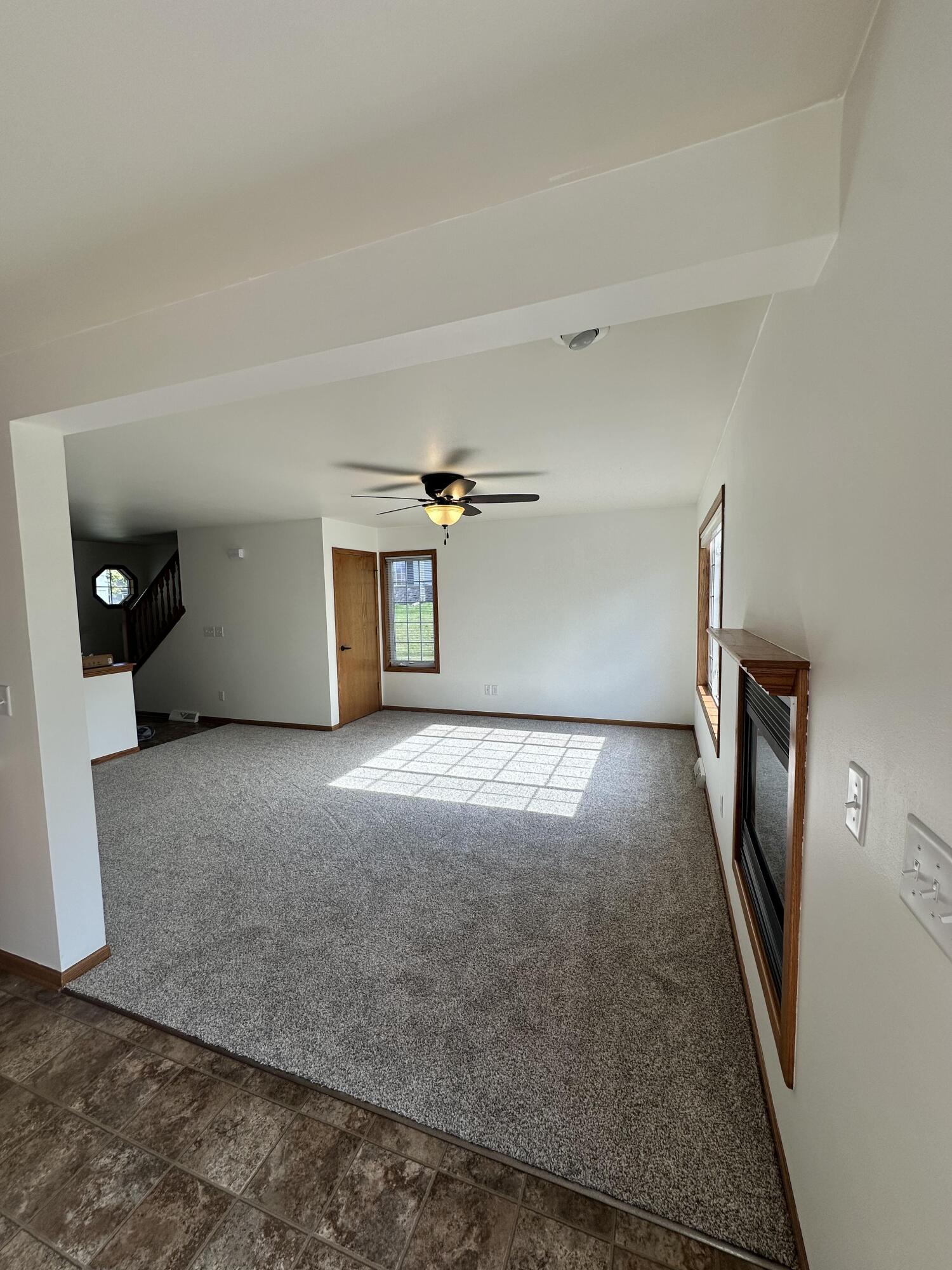 1133 Ellys Way Slinger, WI 53086 - Photo 31 of 35 Robert McCaigue - 1135 - Living Room