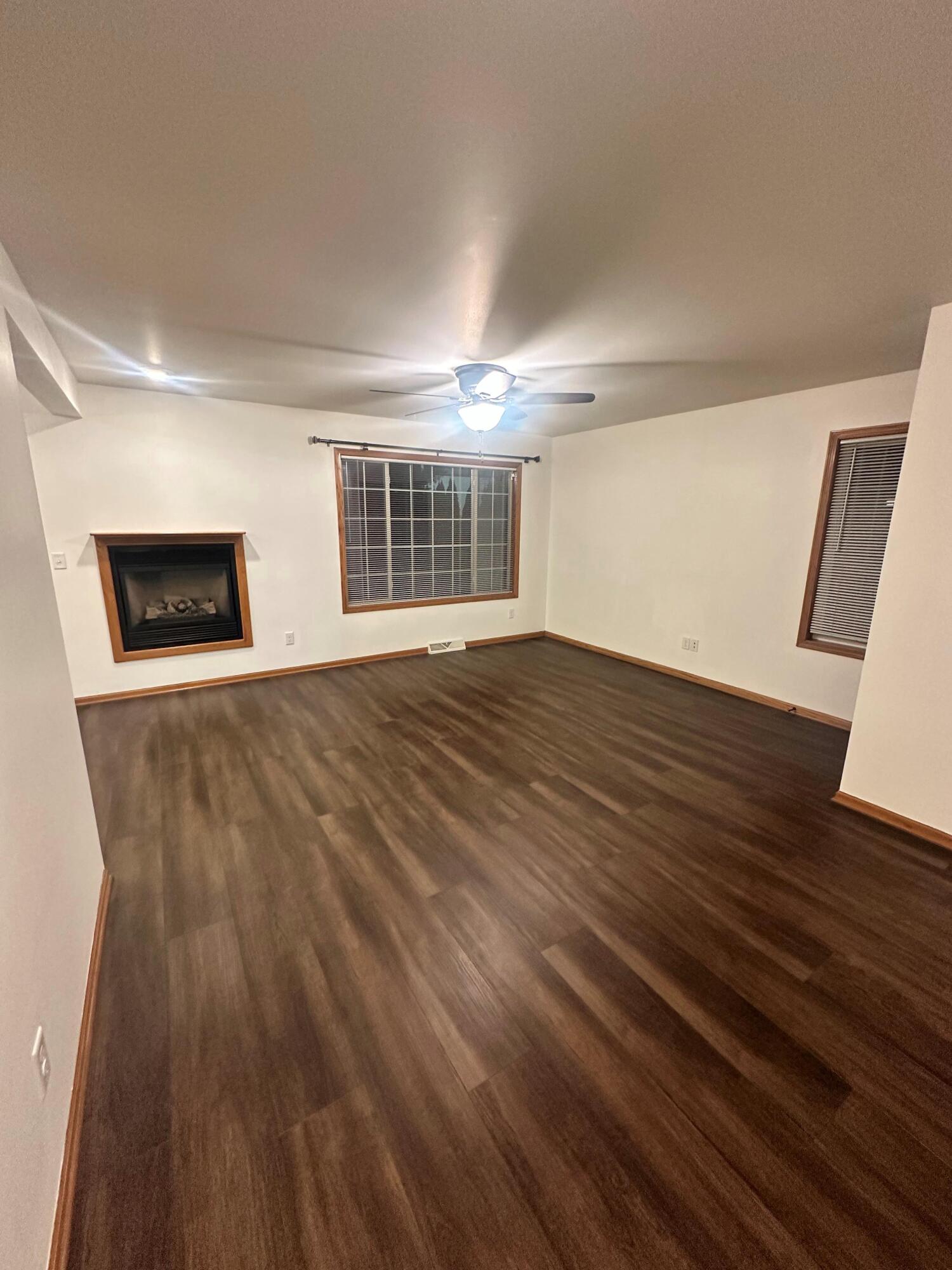 1133 Ellys Way Slinger, WI 53086 - Photo 9 of 35 Robert McCaigue - 1133 - Living Room 2