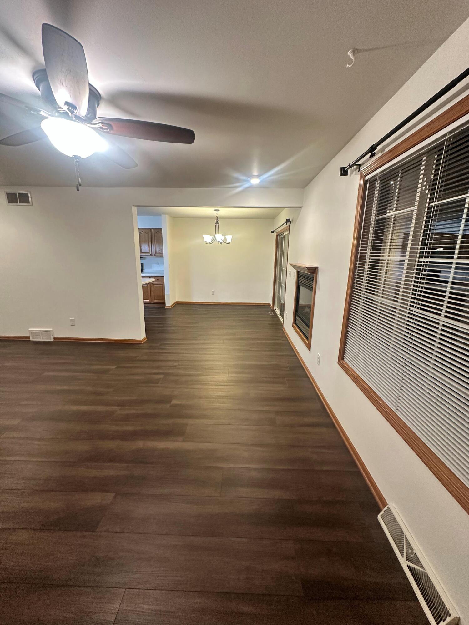 1133 Ellys Way Slinger, WI 53086 - Photo 10 of 35 Robert McCaigue - 1133 - Living Room 3