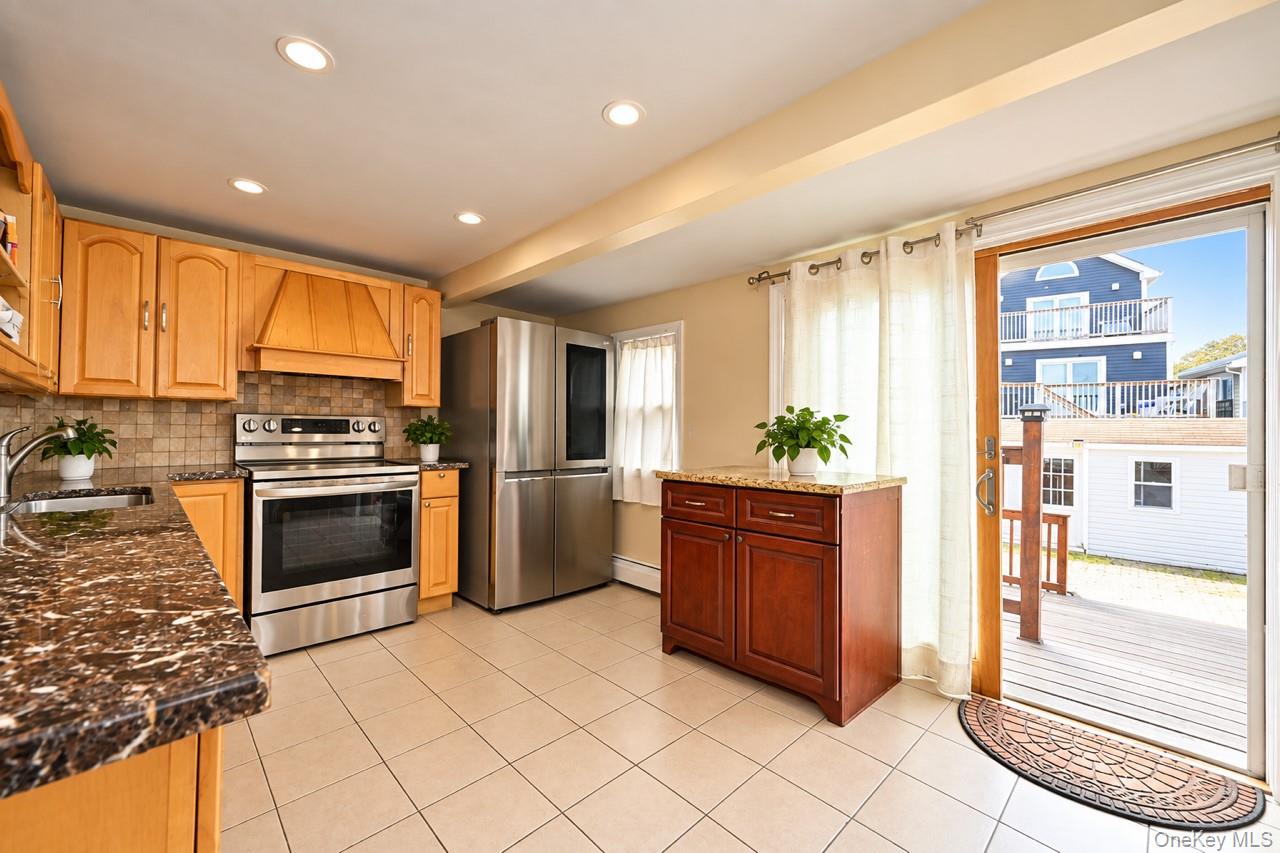 108 East 6th Road Queens, NY 11693 - Photo 7 of 21 Kitchen Patio View
