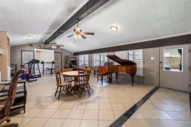 a kitchen with a sink and a stove top oven