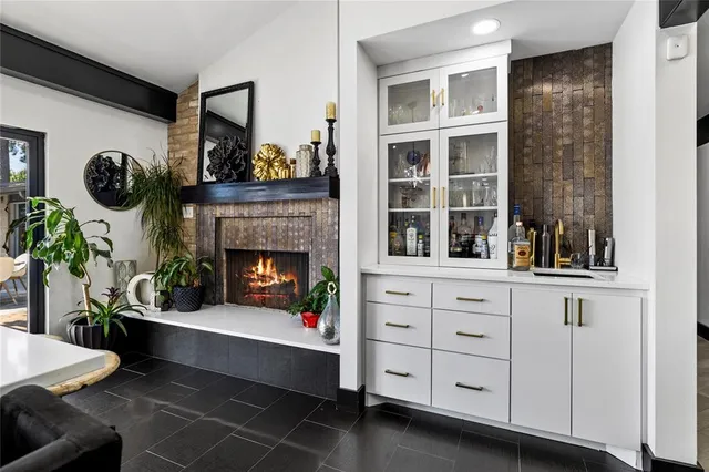 a kitchen with a sink stove and refrigerator
