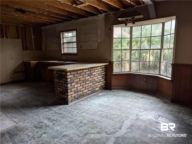 3817 Lansdowne Circle Mobile, AL 36693 - Photo 5 of 16 Interior space with kitchen peninsula and a healthy amount of sunlight