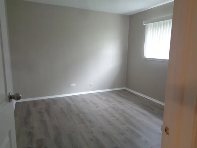 a view of an empty room with window