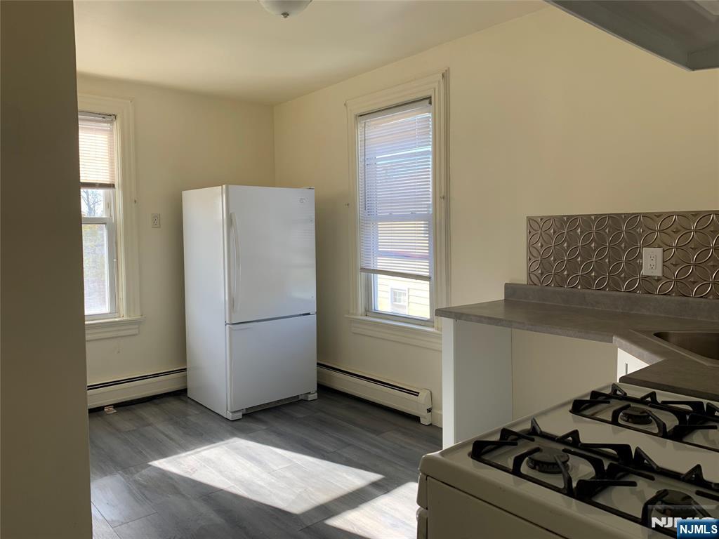 505 Schuyler Avenue, Unit 1 North Arlington, NJ 07031 - Photo 2 of 5 a view of kitchen and utility room