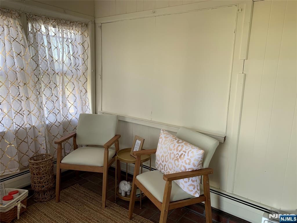 505 Schuyler Avenue, Unit 1 North Arlington, NJ 07031 - Photo 5 of 5 a view of a room with furniture and wooden floor