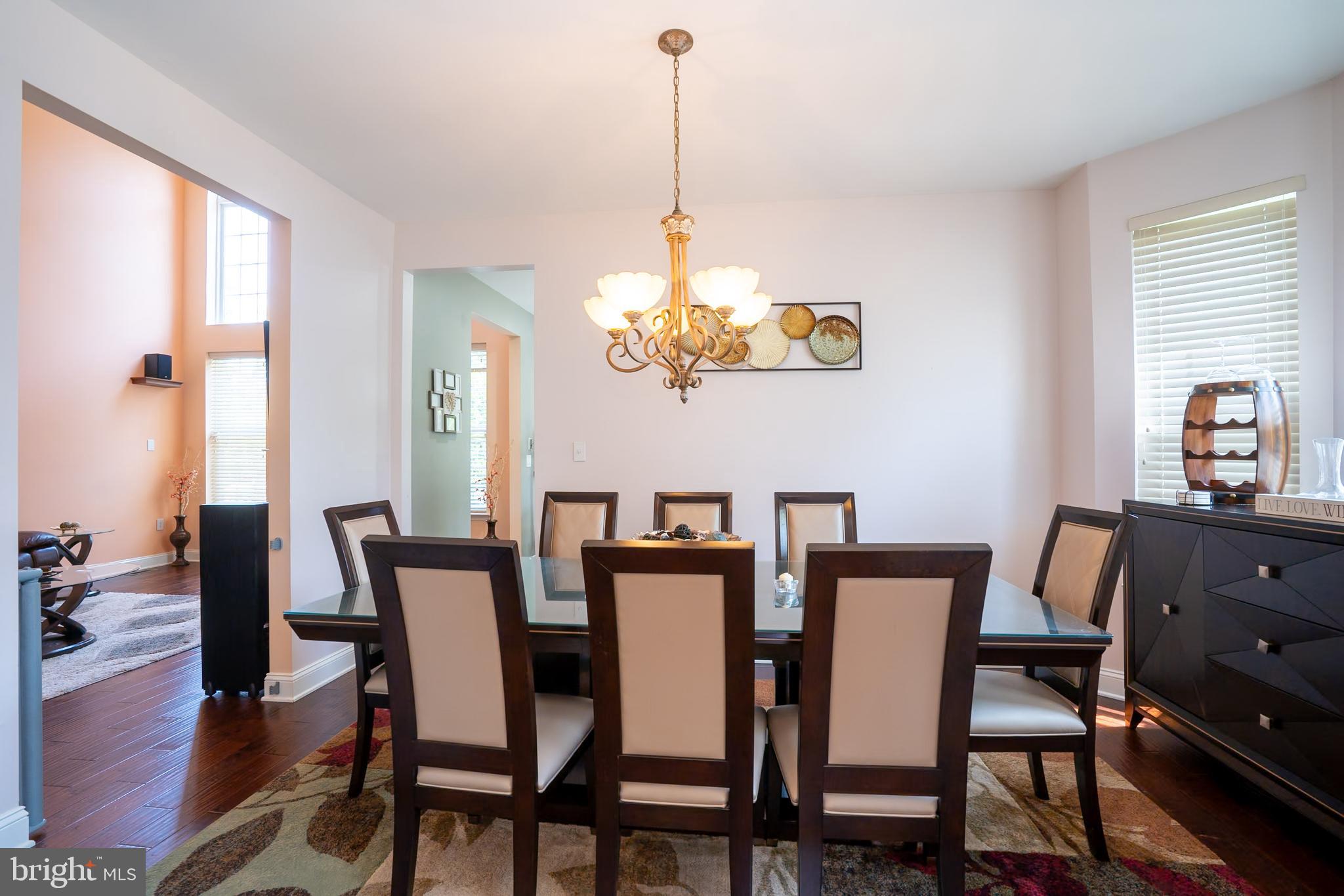 101 Beacon Drive Deptford, NJ 08096 - Photo 11 of 40 a view of a dining room with furniture window and wooden floor