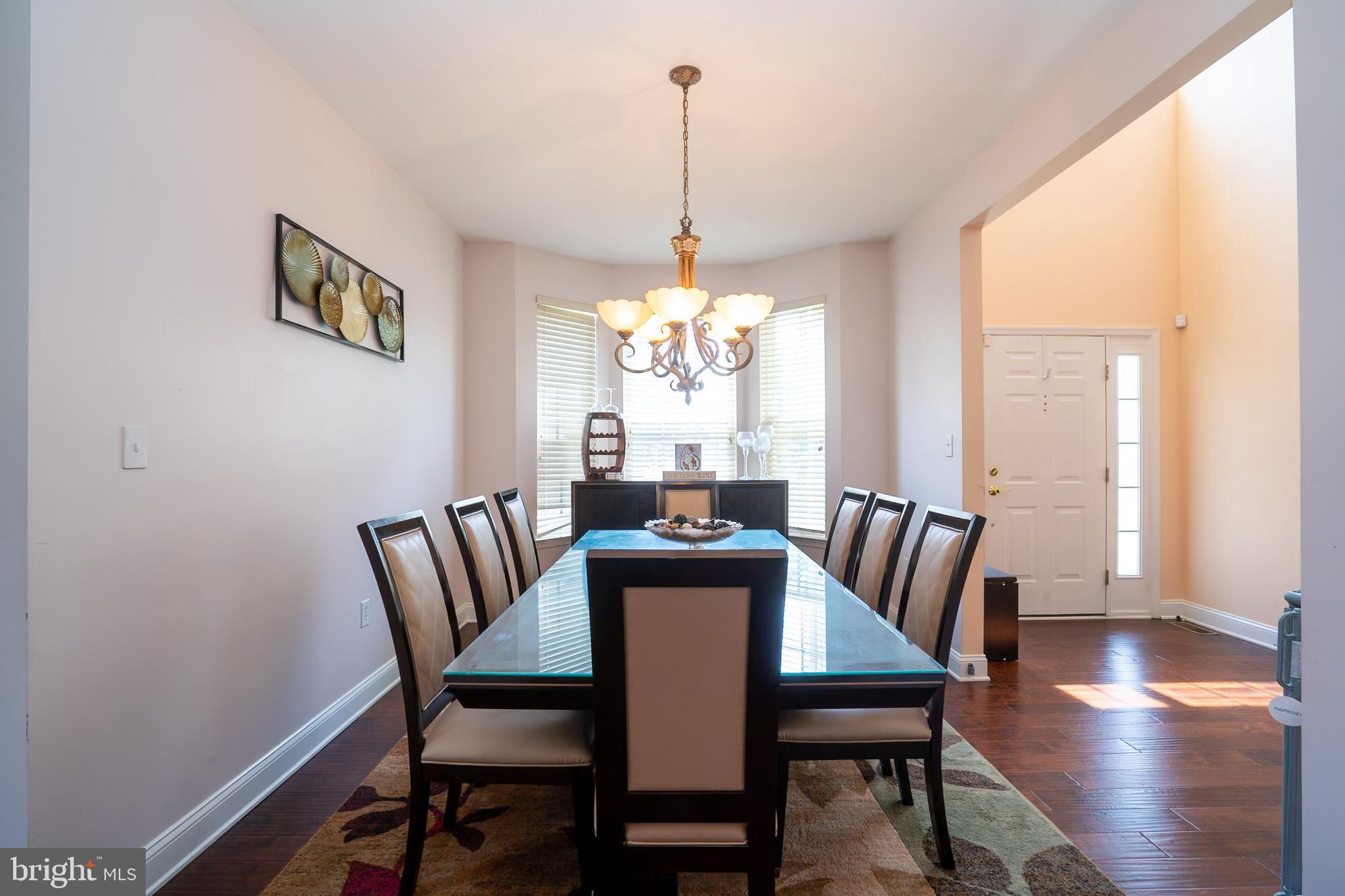 101 Beacon Drive Deptford, NJ 08096 - Photo 12 of 40 a view of a dining room with furniture window and wooden floor