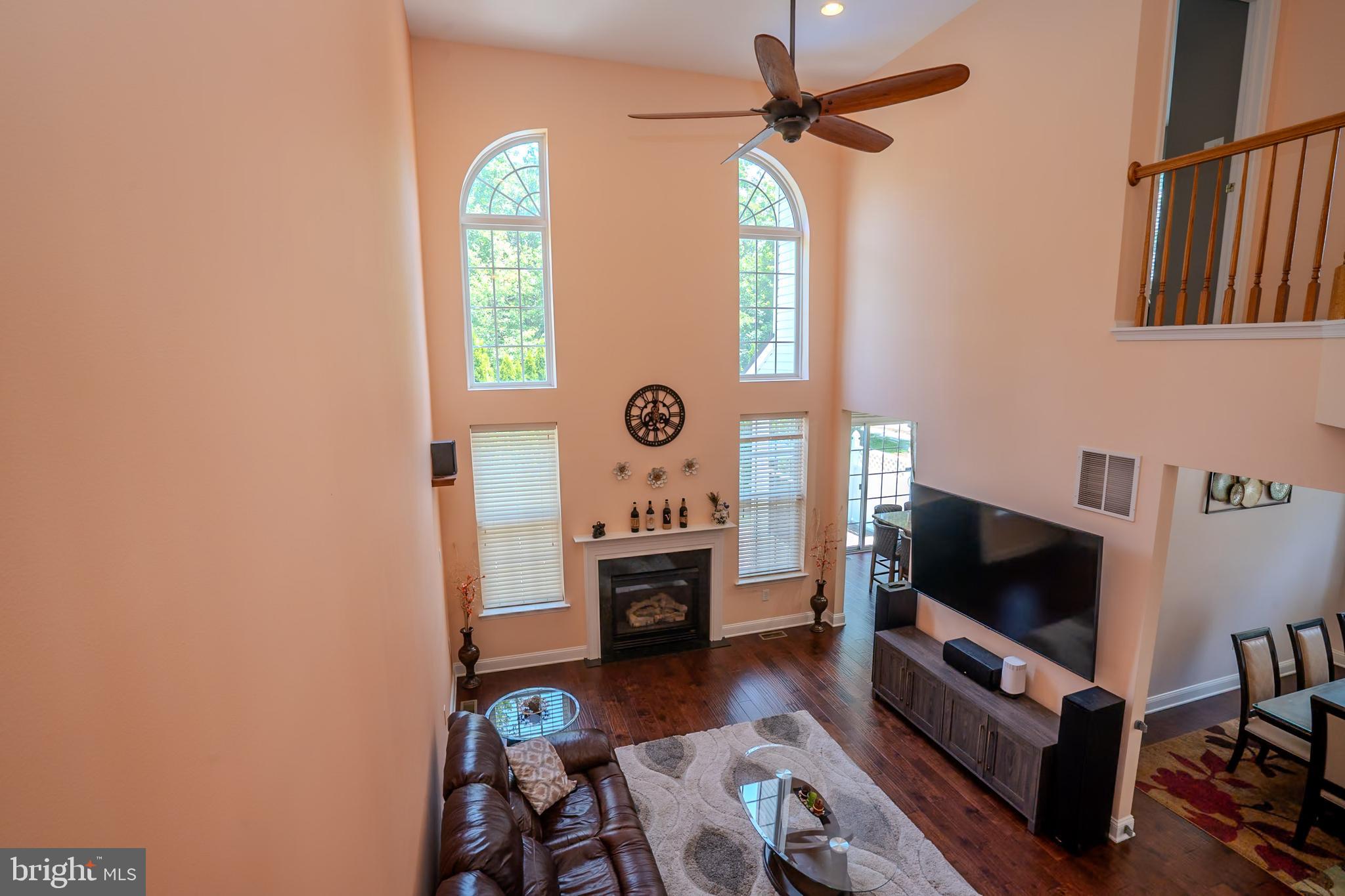 101 Beacon Drive Deptford, NJ 08096 - Photo 14 of 40 a living room with furniture and a flat screen tv