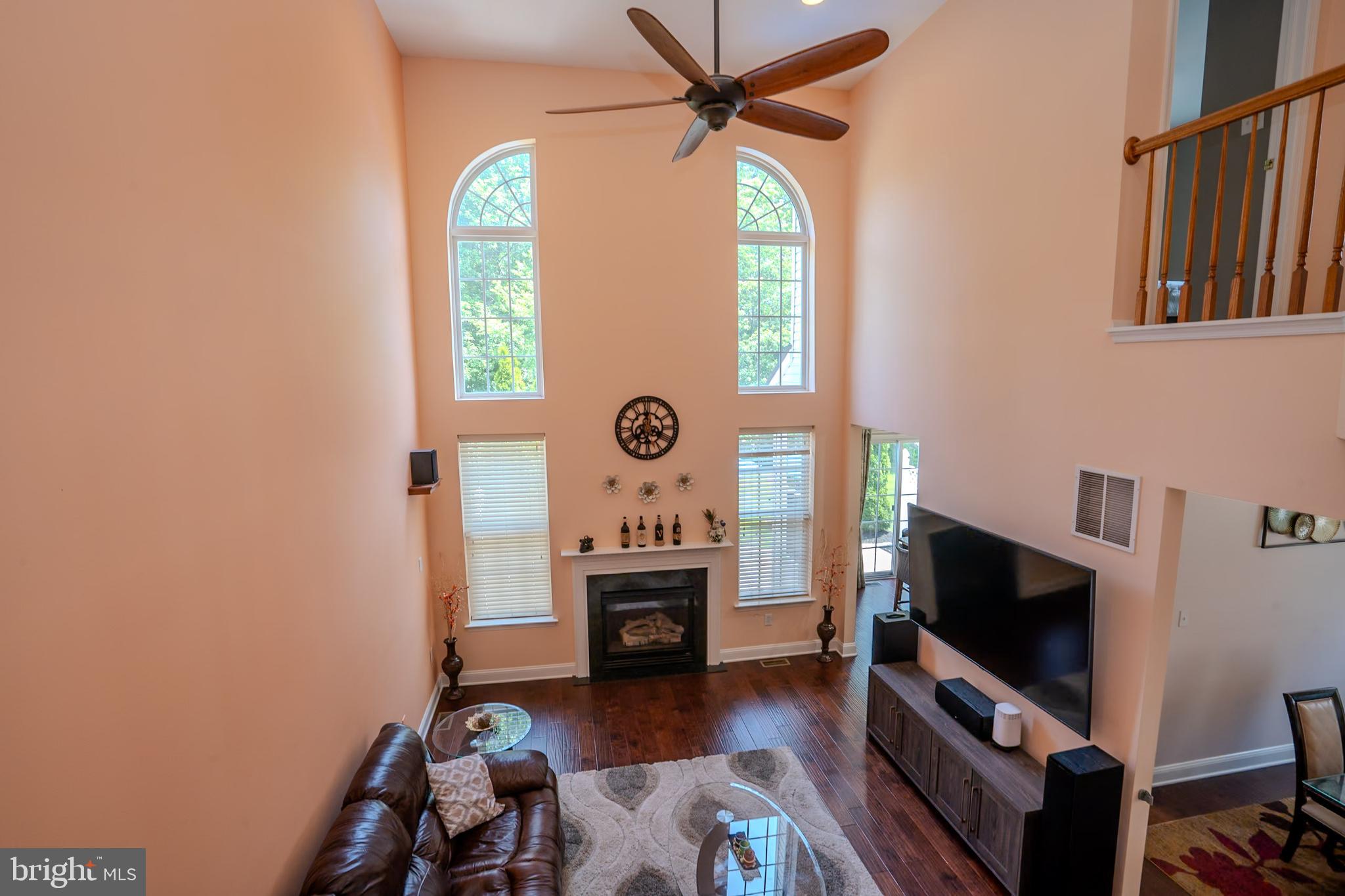 101 Beacon Drive Deptford, NJ 08096 - Photo 15 of 40 a living room with furniture and a flat screen tv