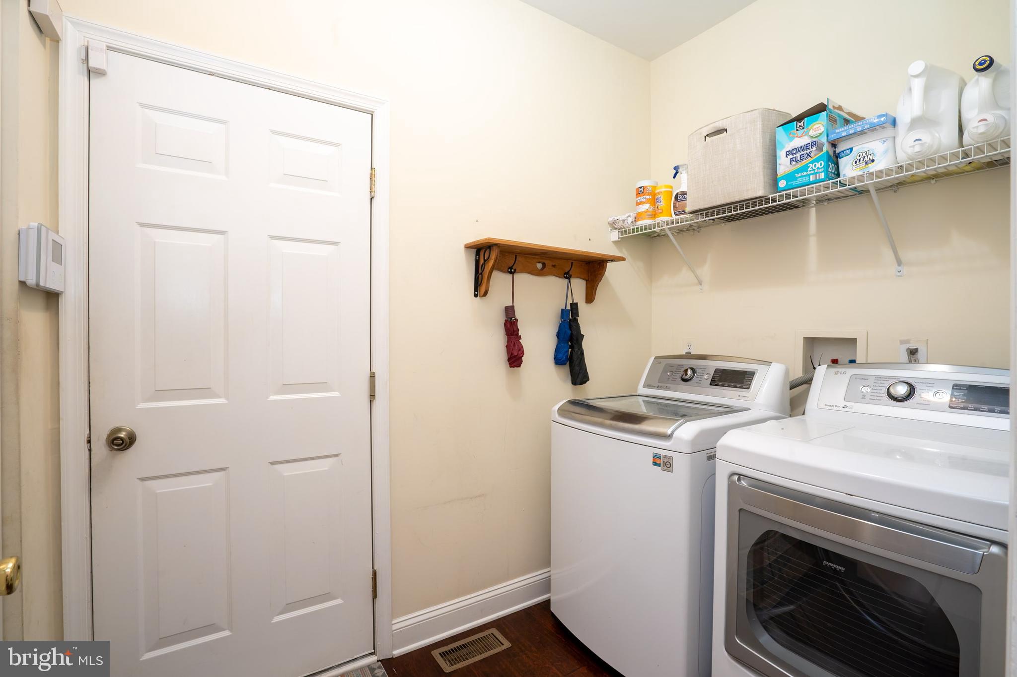 101 Beacon Drive Deptford, NJ 08096 - Photo 16 of 40 a utility room with dryer and washer