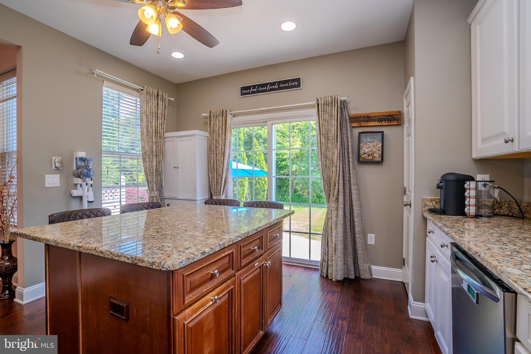 101 Beacon Drive Deptford, NJ 08096 - Photo 19 of 40 a kitchen with kitchen island granite countertop a stove and a center island