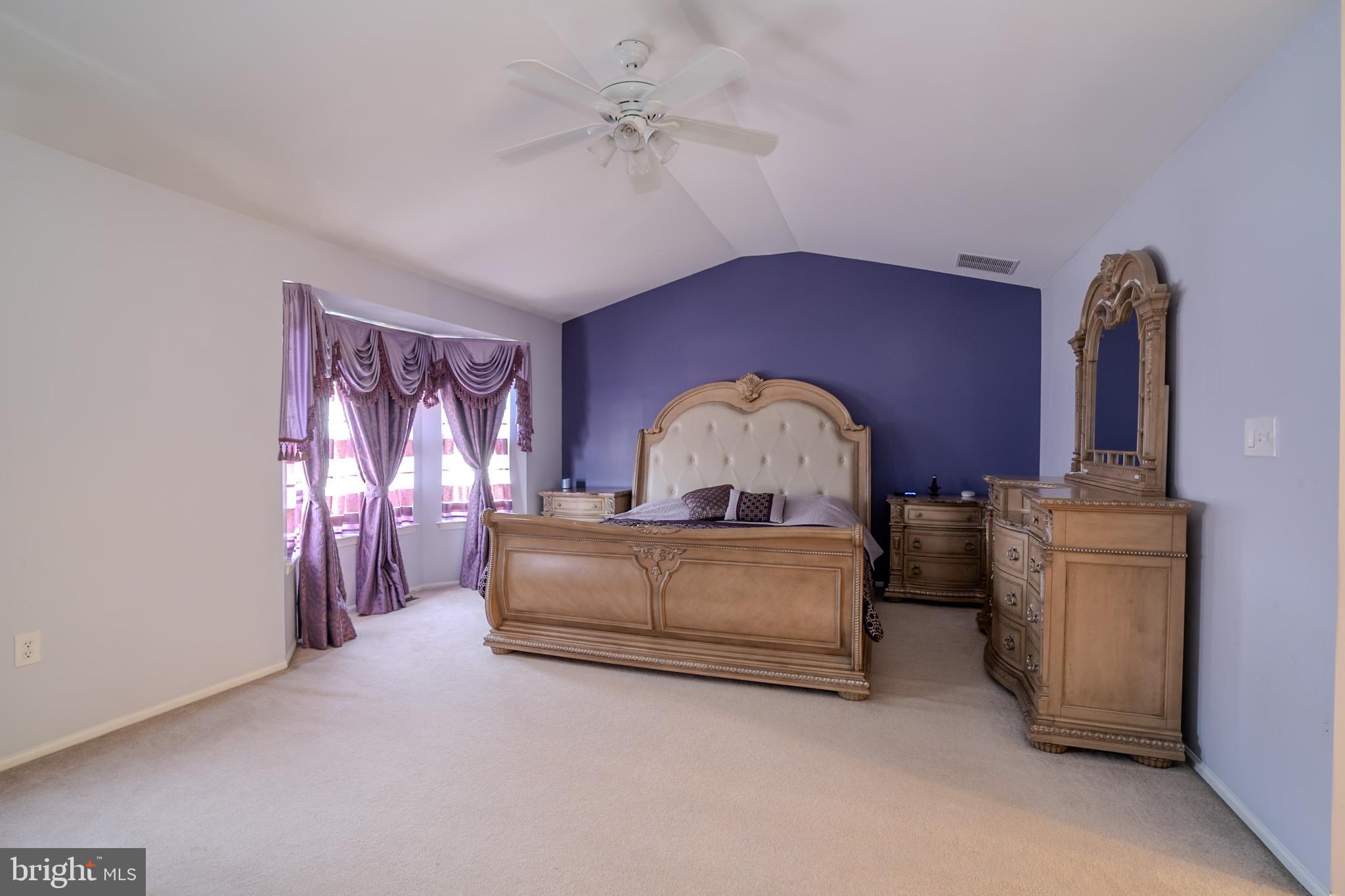 101 Beacon Drive Deptford, NJ 08096 - Photo 23 of 40 a living room with furniture and a chandelier