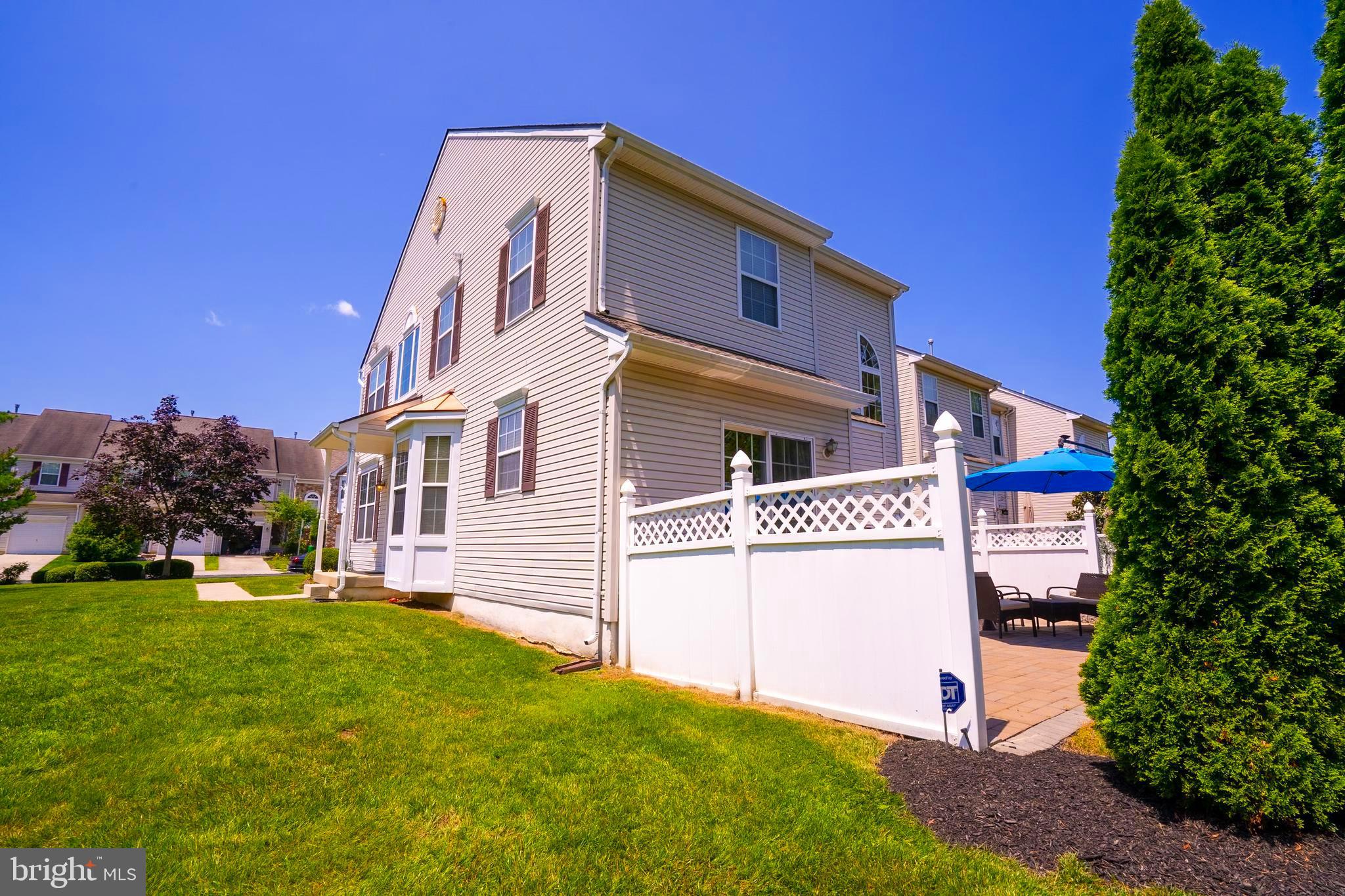 101 Beacon Drive Deptford, NJ 08096 - Photo 39 of 40 a front view of a house with a yard