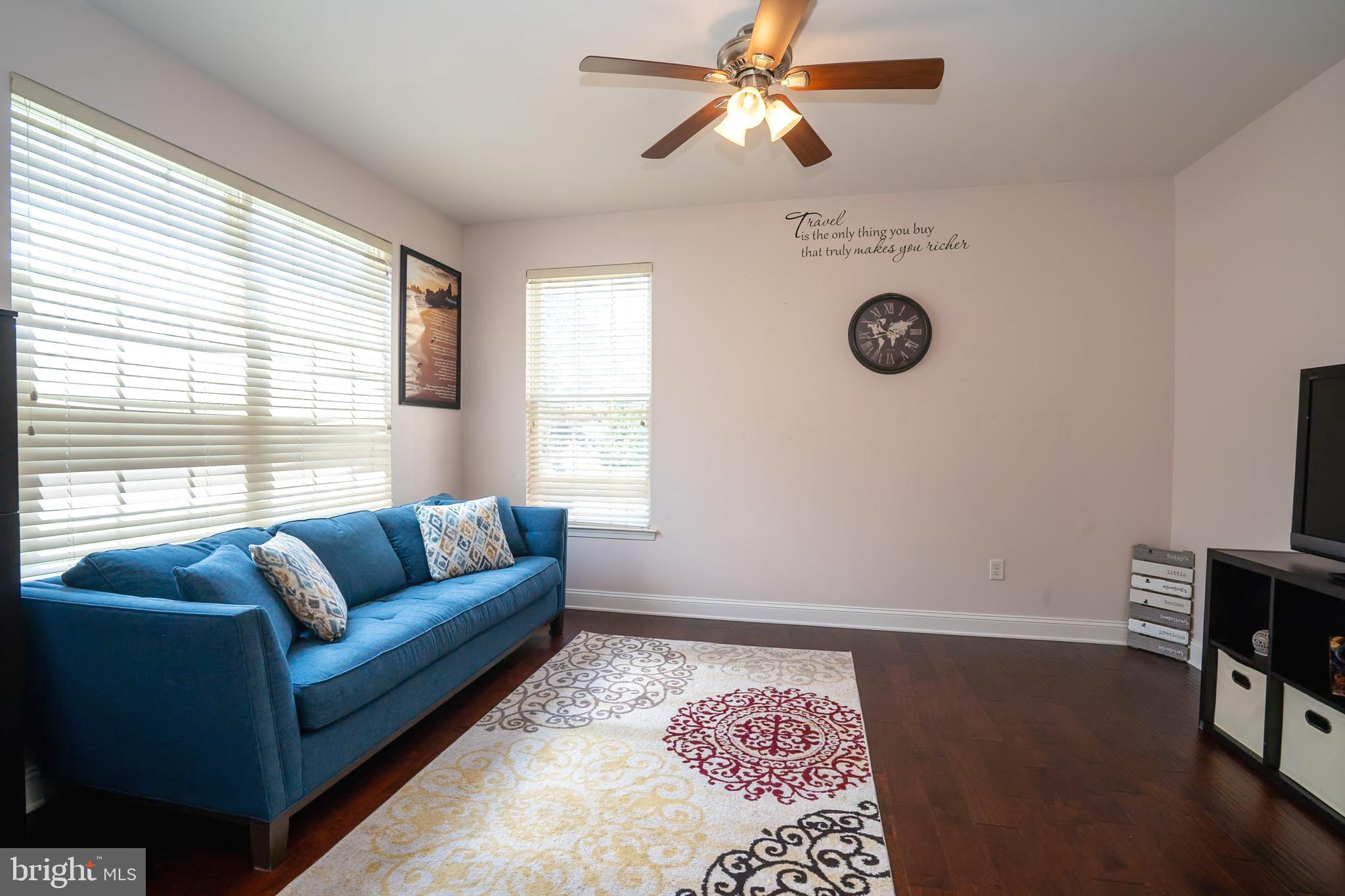101 Beacon Drive Deptford, NJ 08096 - Photo 9 of 40 a living room with furniture and a window