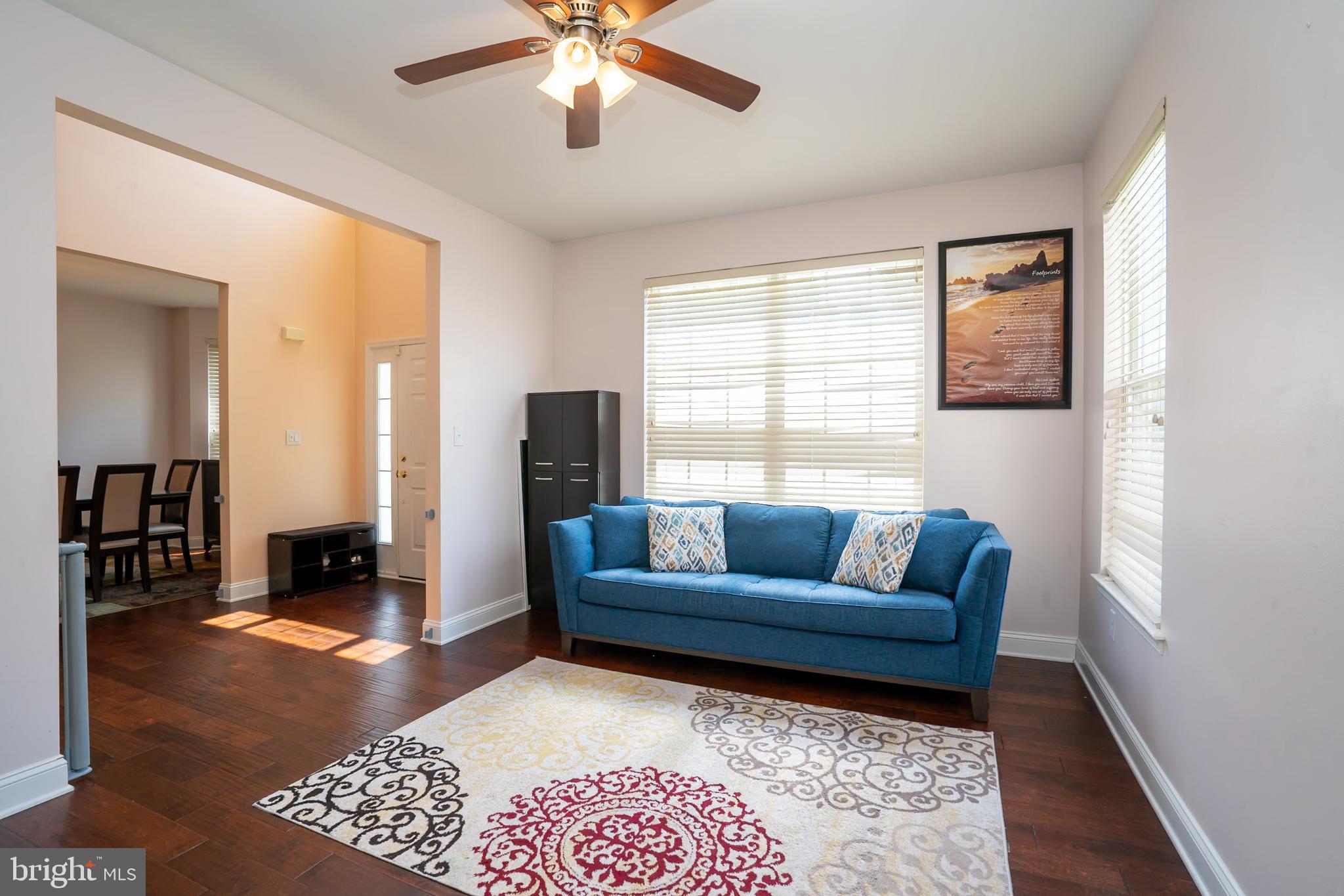 101 Beacon Drive Deptford, NJ 08096 - Photo 10 of 40 a living room with furniture and a rug