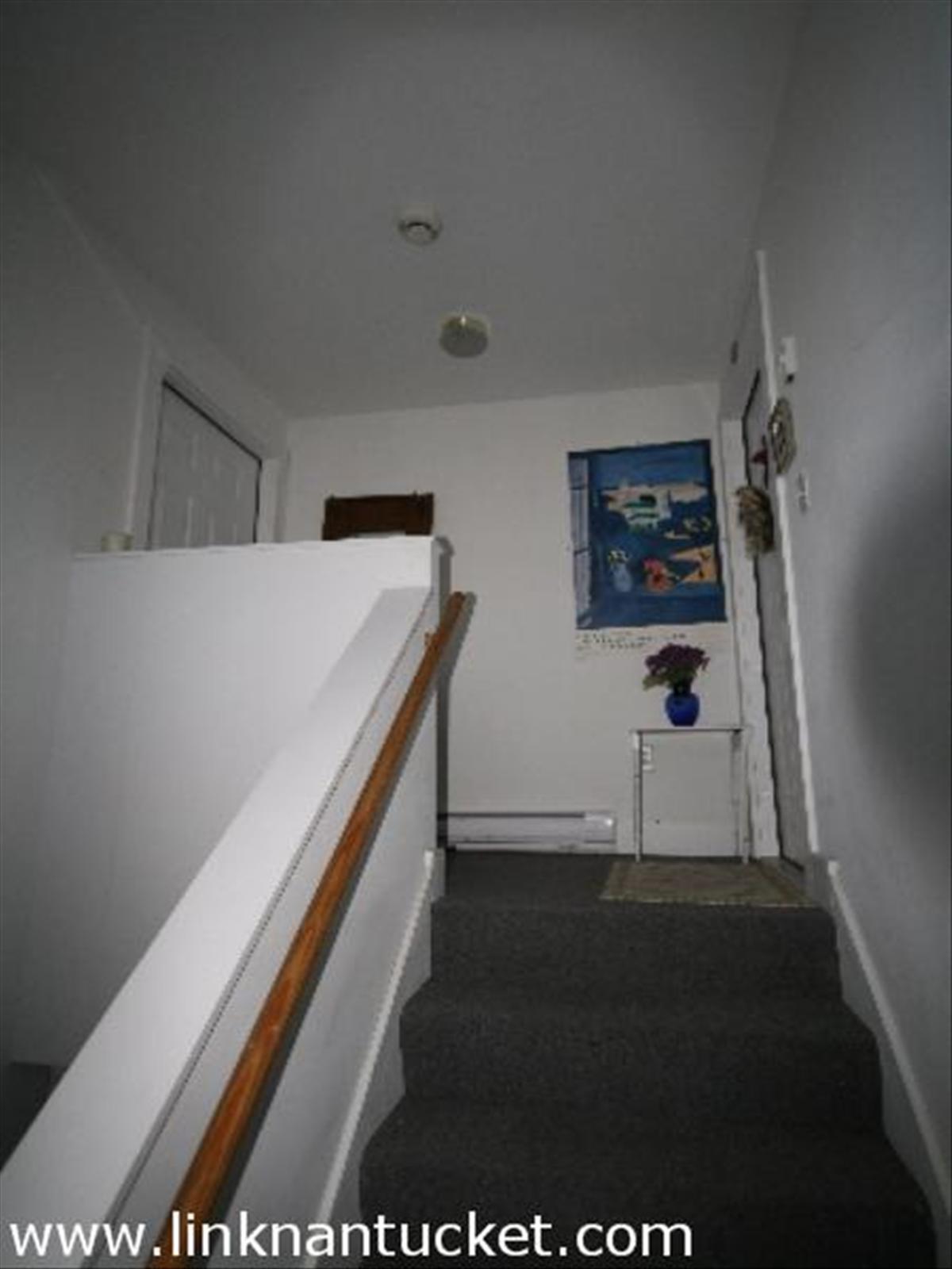 37 Old South Road, Unit 15 Nantucket, MA 02554 - Photo 6 of 11 Entry stairs