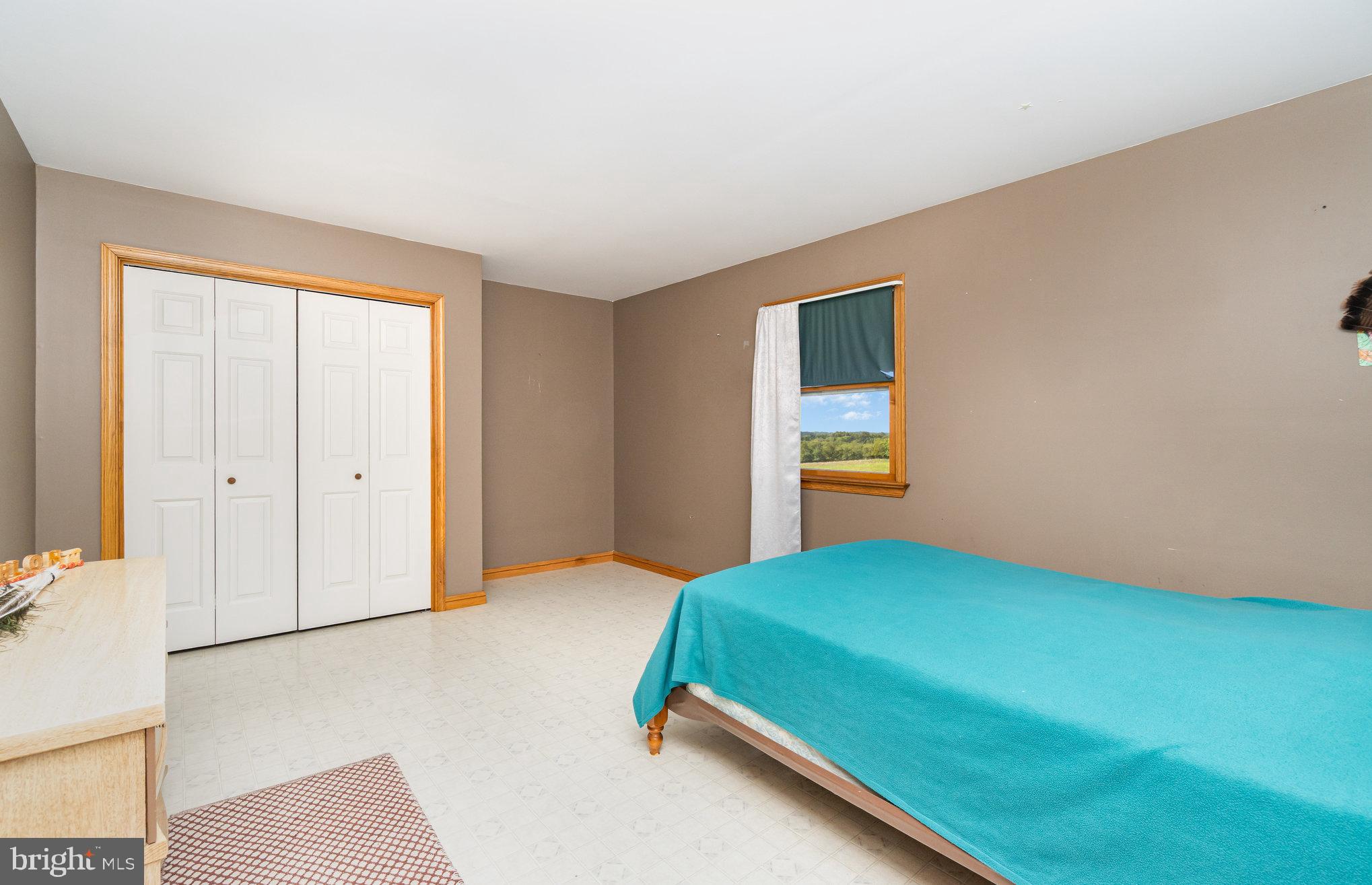 72 Quigley Road Newburg, PA 17240 - Photo 18 of 69 a bedroom with a bed and a window