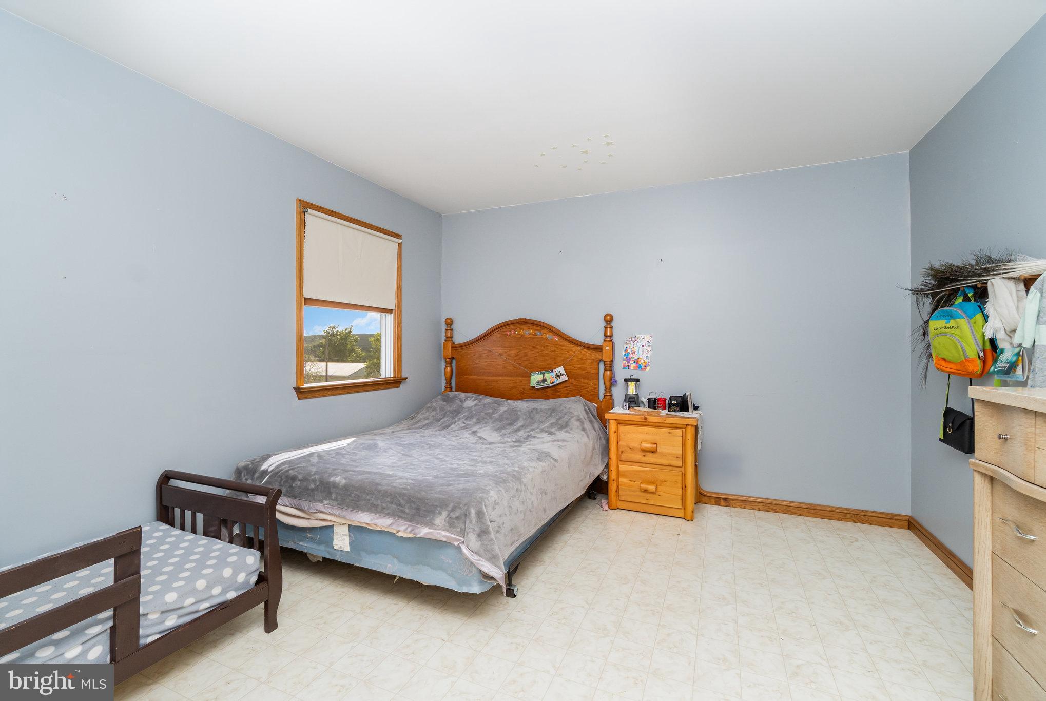 72 Quigley Road Newburg, PA 17240 - Photo 20 of 69 a bedroom with a bed and a dresser