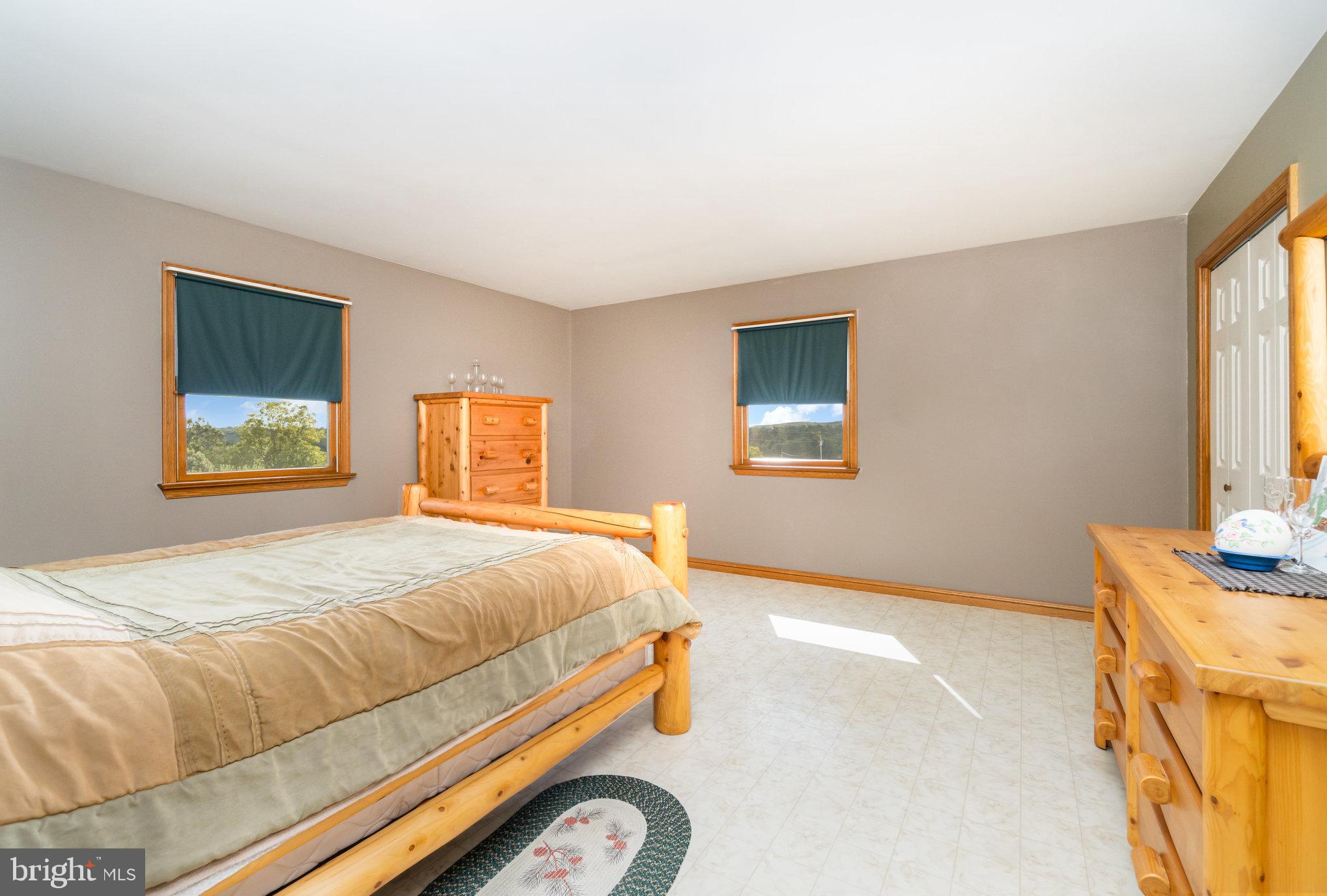 72 Quigley Road Newburg, PA 17240 - Photo 22 of 69 a bedroom with a bed and a window