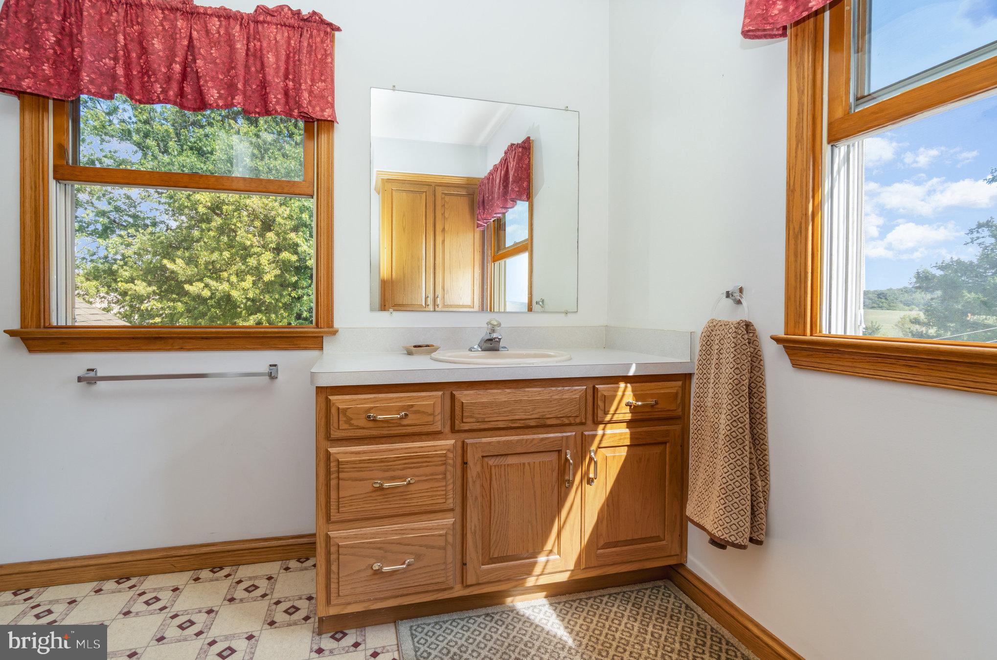 72 Quigley Road Newburg, PA 17240 - Photo 28 of 69 a bathroom with a sink and a mirror