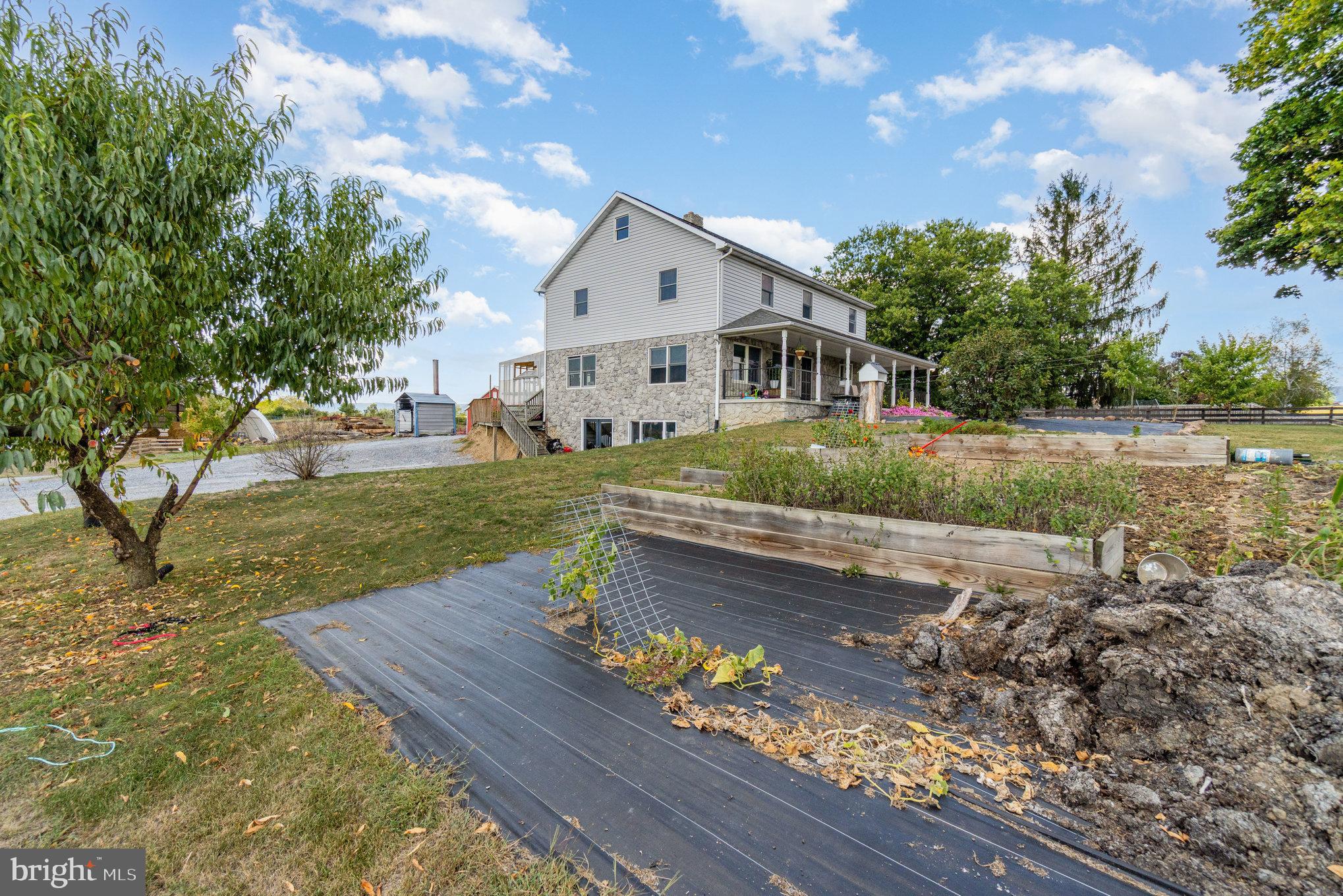 72 Quigley Road Newburg, PA 17240 - Photo 32 of 69 a view of a house with yard and sitting area