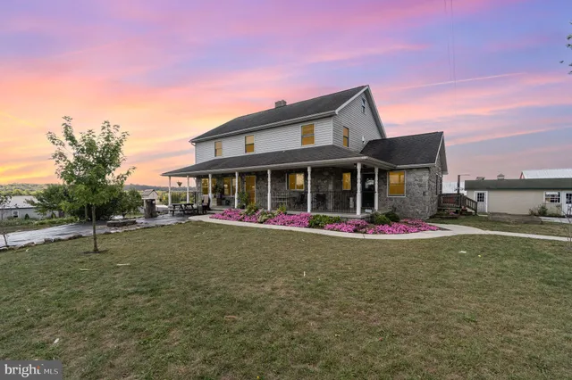 a view of a lake with couches