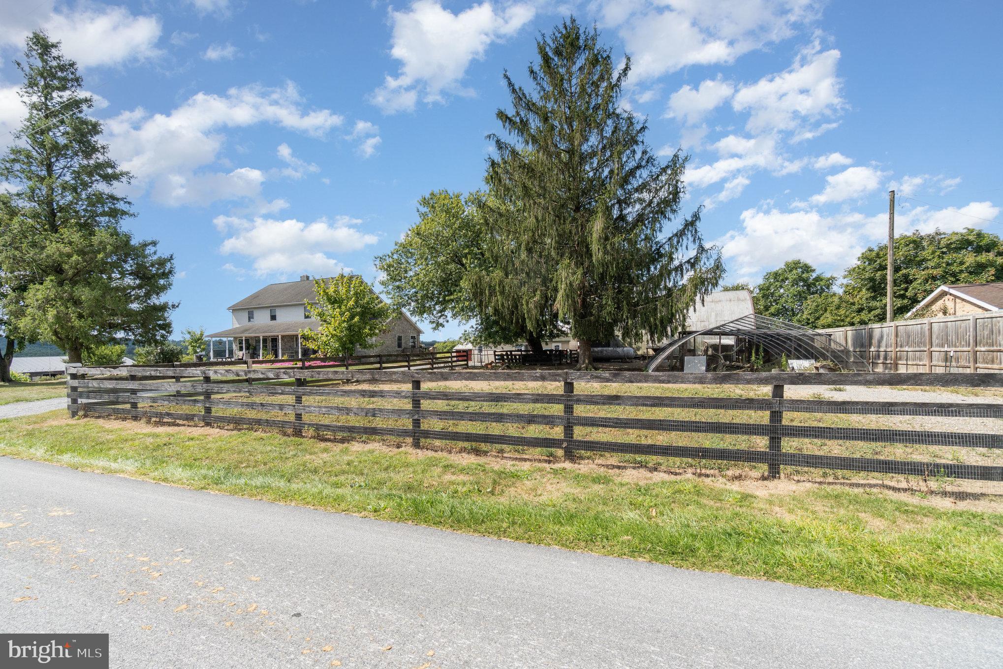 72 Quigley Road Newburg, PA 17240 - Photo 61 of 69 a view of yard with swimming pool and trees