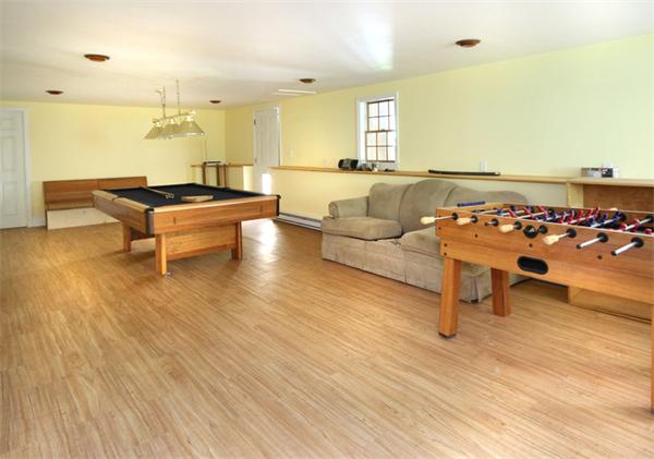 64 Cedar Street Walpole, MA 02081 - Photo 21 of 28 a living room with furniture and a wooden floor