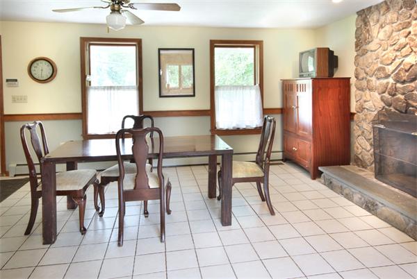 64 Cedar Street Walpole, MA 02081 - Photo 4 of 28 a view of a dining room with furniture and chandelier