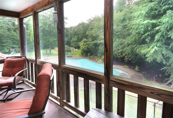 64 Cedar Street Walpole, MA 02081 - Photo 8 of 28 a view of a balcony with chairs