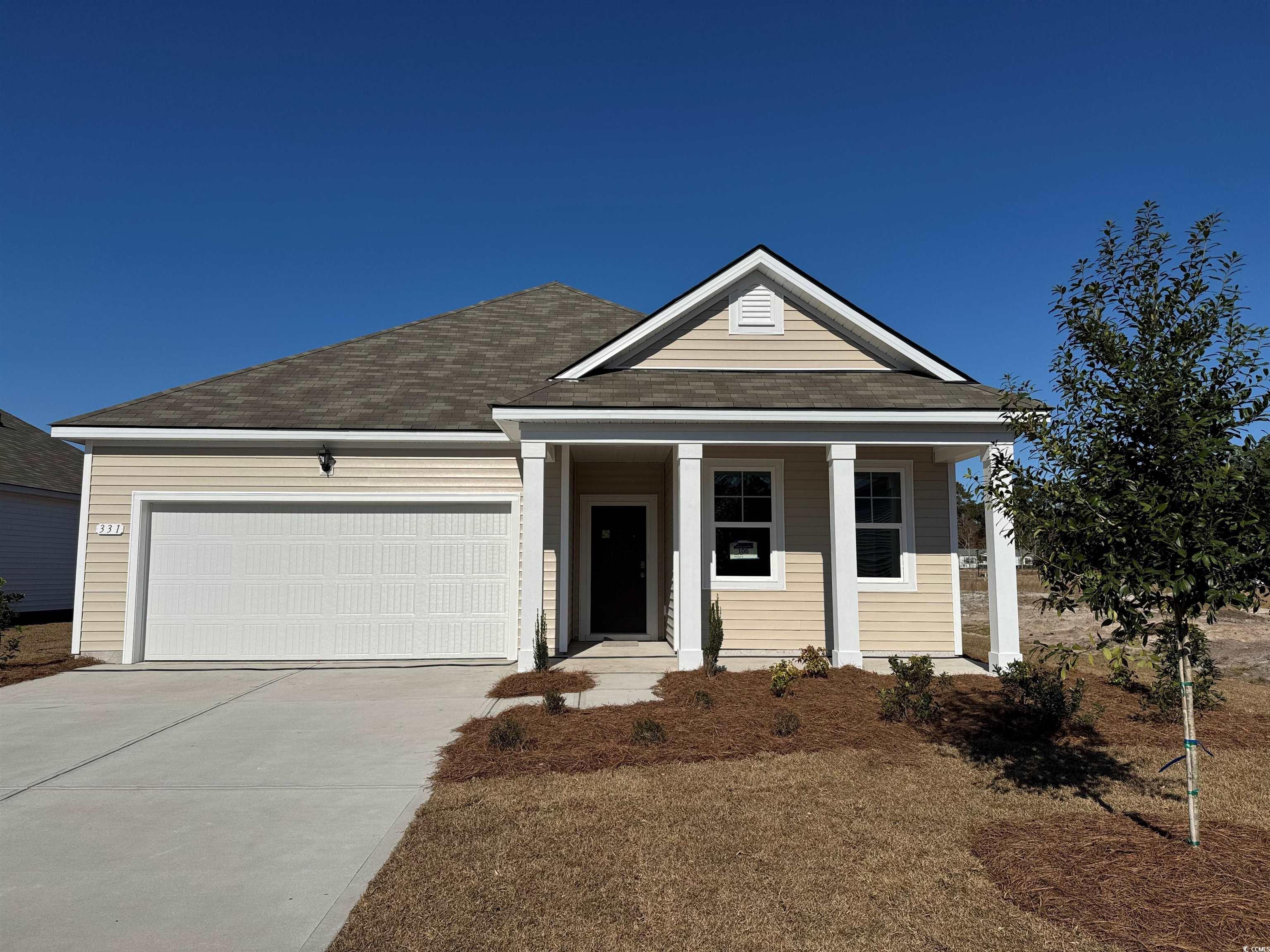331 Cheerful Way Little River, SC 29566 - Photo 1 of 23 View of front of home featuring an attached garage, driveway, a shingled roof, and a porch