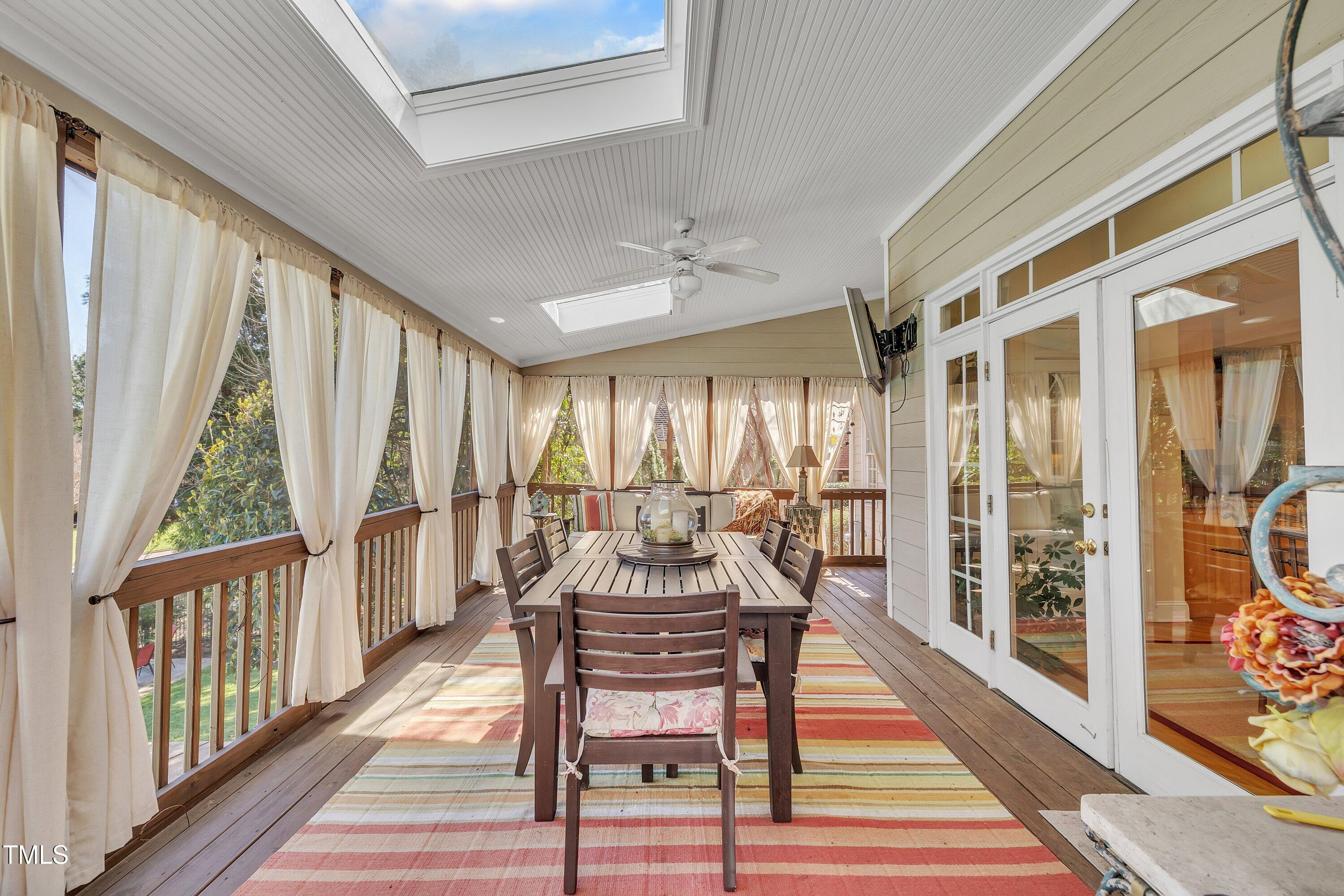 12504 Ribbongrass Court Raleigh, NC 27614 - Photo 37 of 51 Delight in the screened porch w/skylight and beadboard ceiling feature!