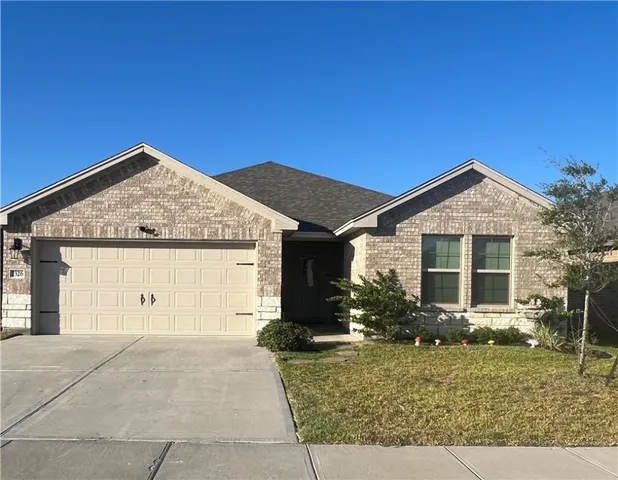 front view of house with a yard