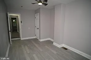 a bathroom with a shower and a toilet