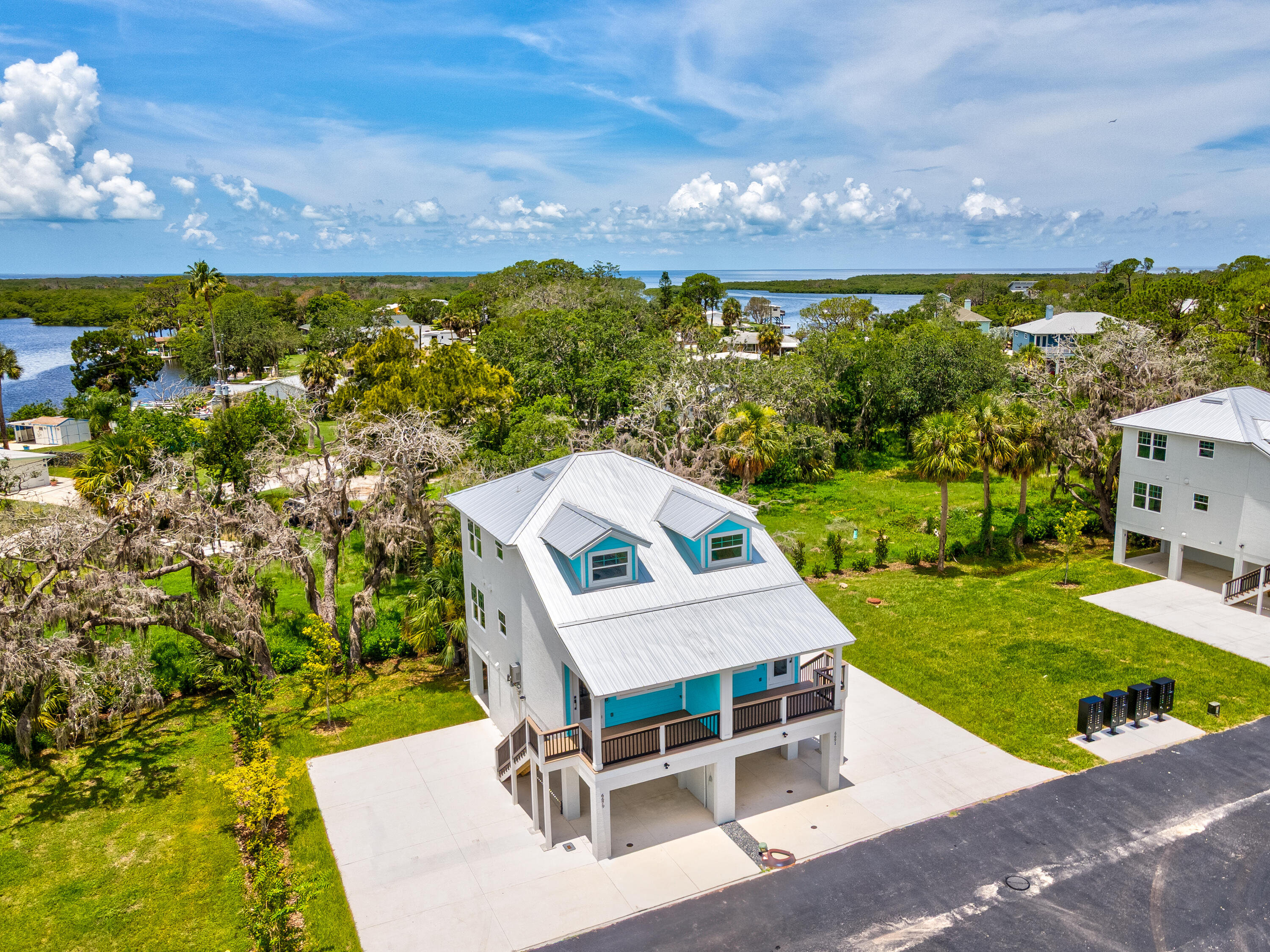6691 Wander Lane New Port Richey, FL 34652 - Photo 4 of 40 078-DJI_0448_49_50_51_52