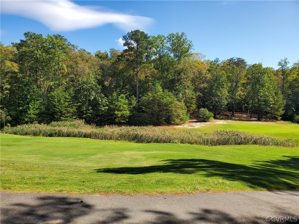 0 Steamboat Road Hartfield, VA 23071 - Photo 2 of 13 a view of a golf course with a big yard