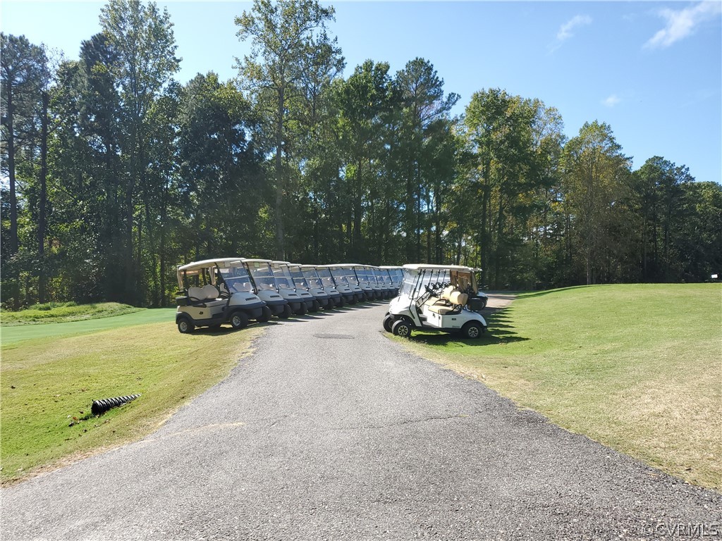 0 Steamboat Road Hartfield, VA 23071 - Photo 3 of 13 a car parked in the middle of a field