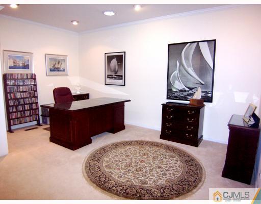 3 Fox Hill Road Edison, NJ 08820 - Photo 6 of 10 a living room with furniture piano and a table