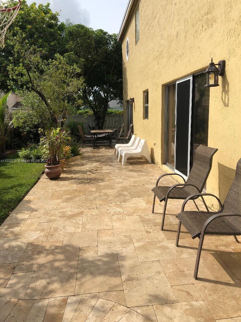 River Run Miramar, FL 33025 - Photo 19 of 23 a view of a terrace with chairs