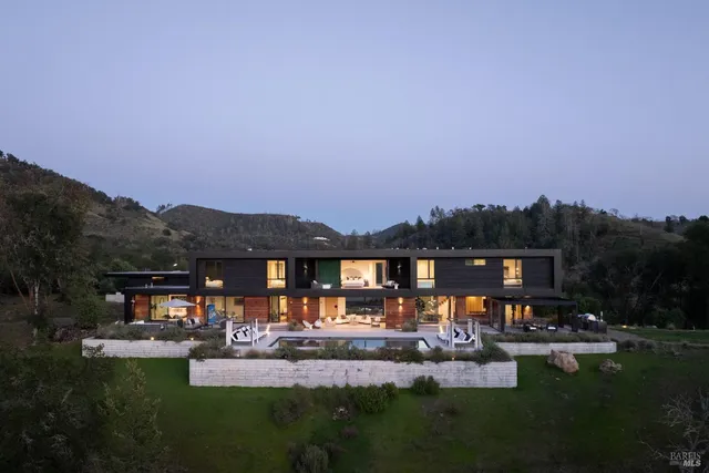 a view of house with outdoor space and garden