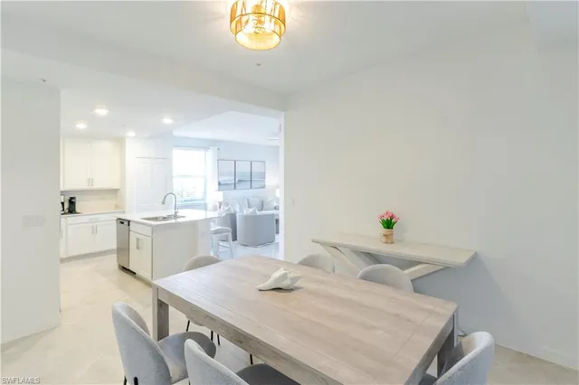 a view of kitchen with breakfast area